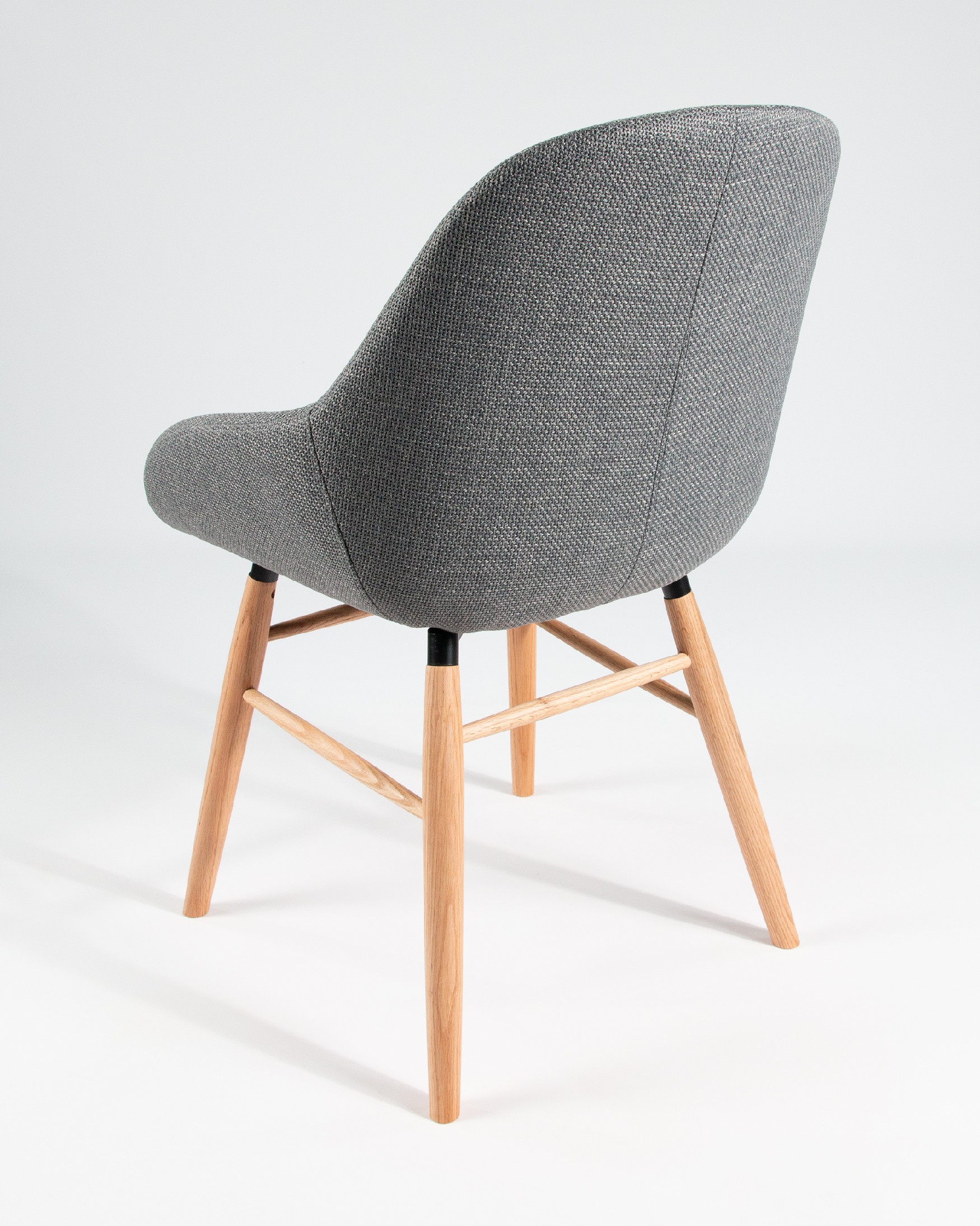 Ottawa chair with gray upholstery and wooden legs