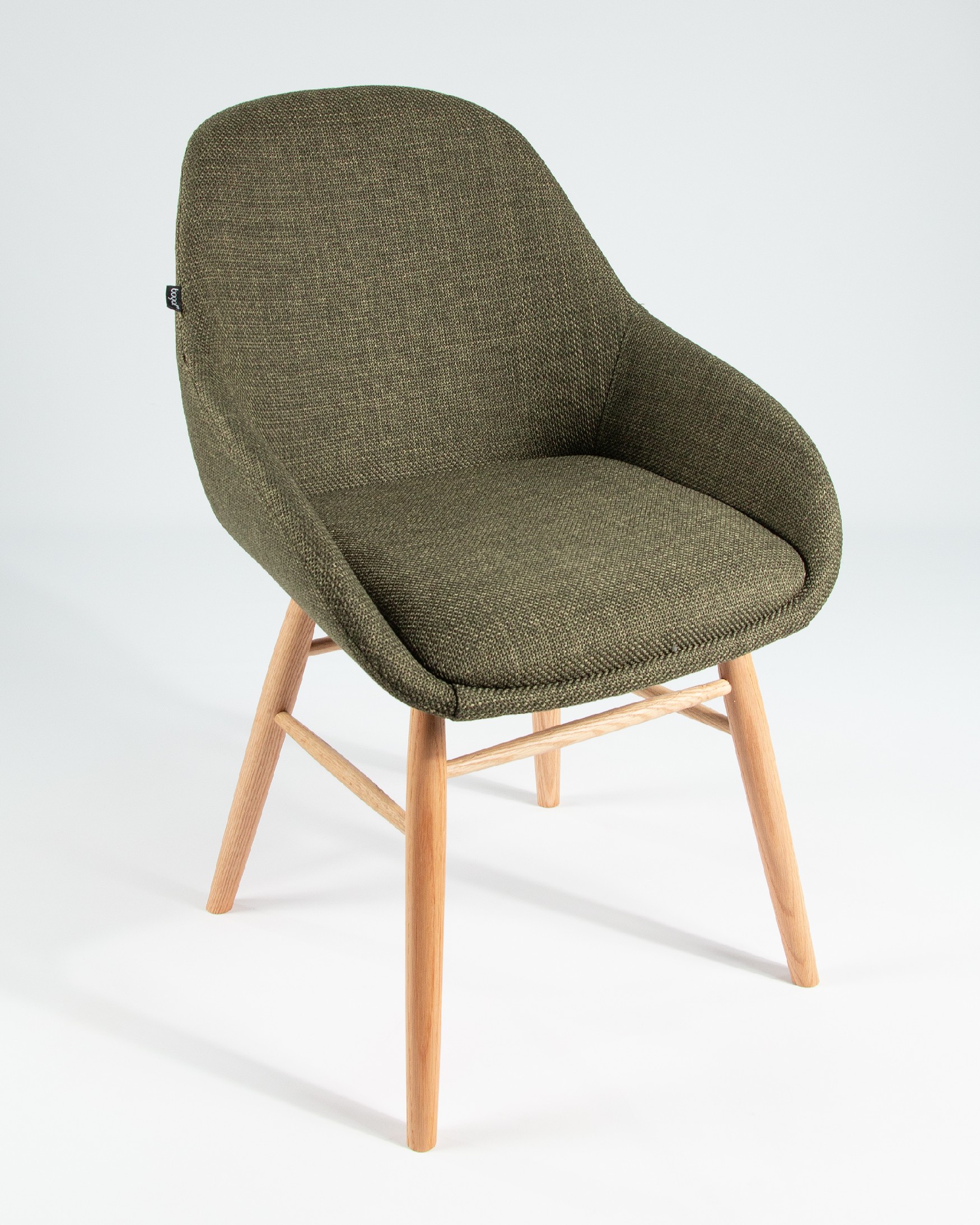Ottawa chair with green upholstery and wooden legs