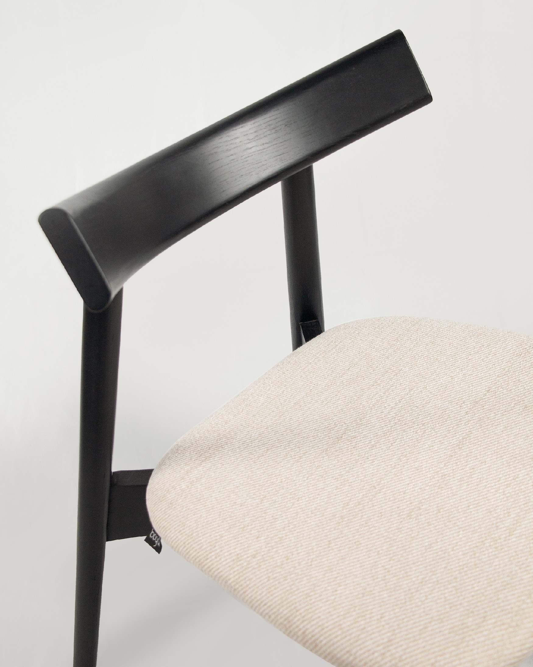 Ovis chair with mother-of-pearl upholstery and black oak frame