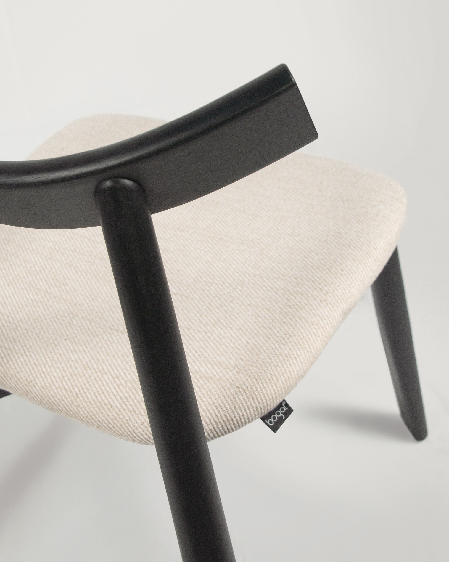 Ovis chair with mother-of-pearl upholstery and black oak frame