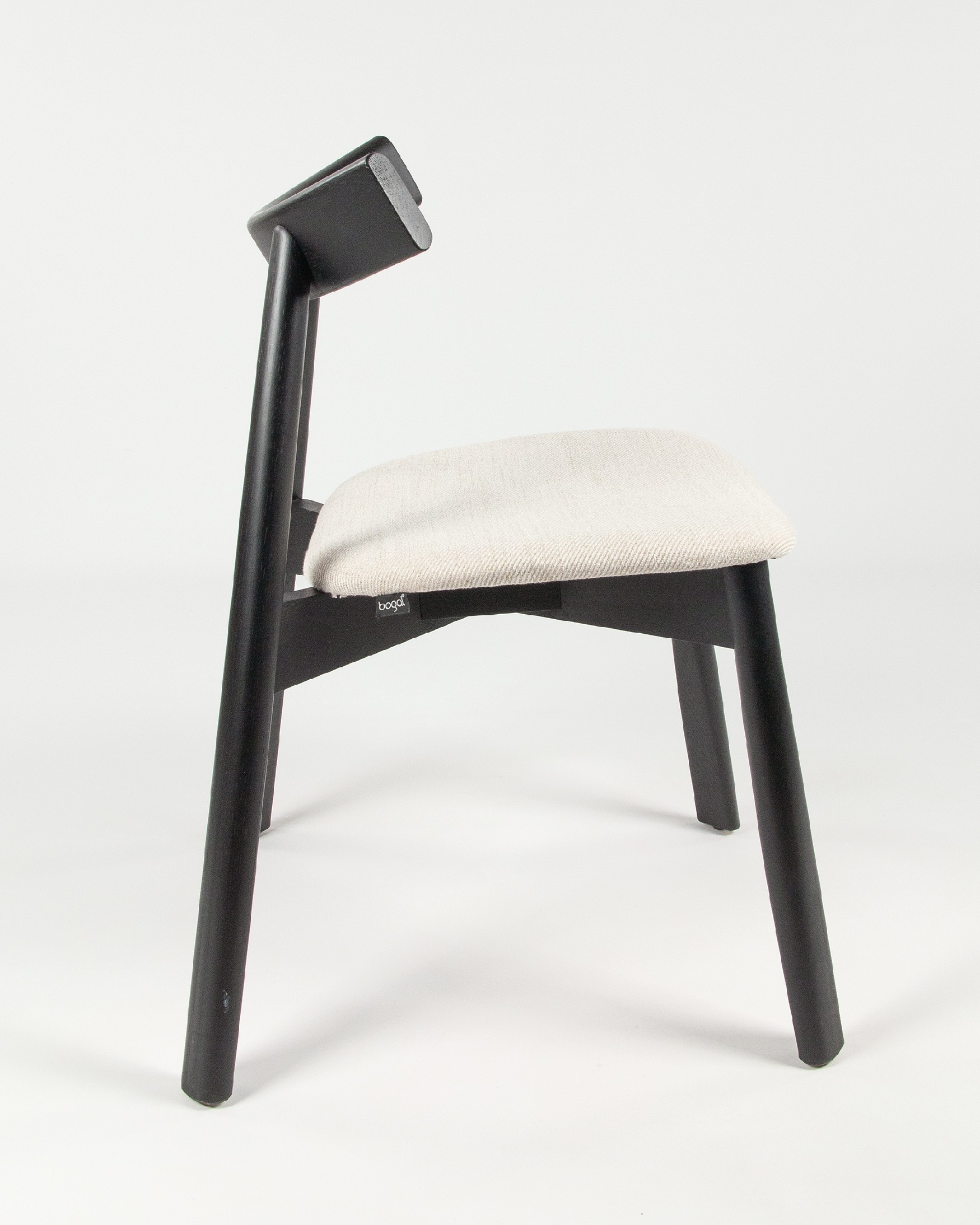 Ovis chair with mother-of-pearl upholstery and black oak frame