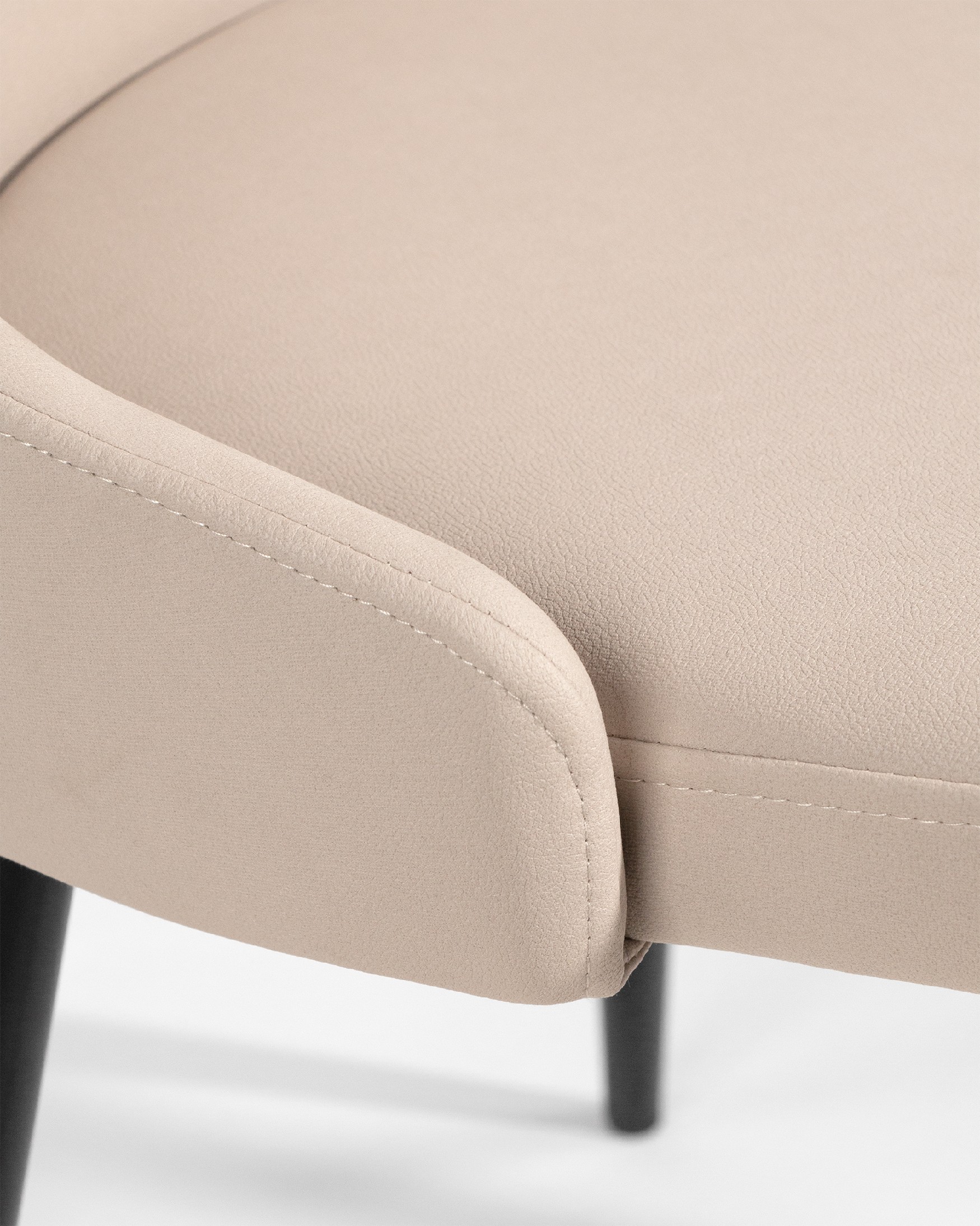 París chair with beige upholstery and black legs