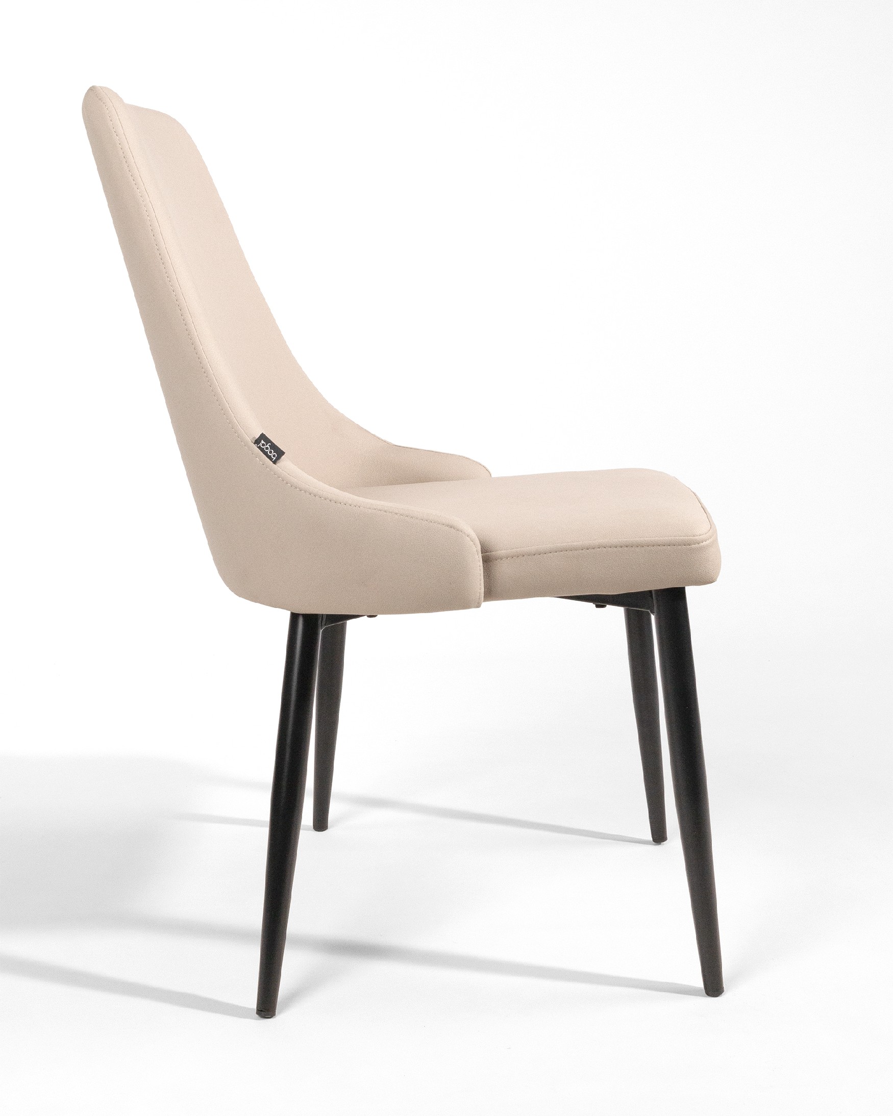París chair with beige upholstery and black legs