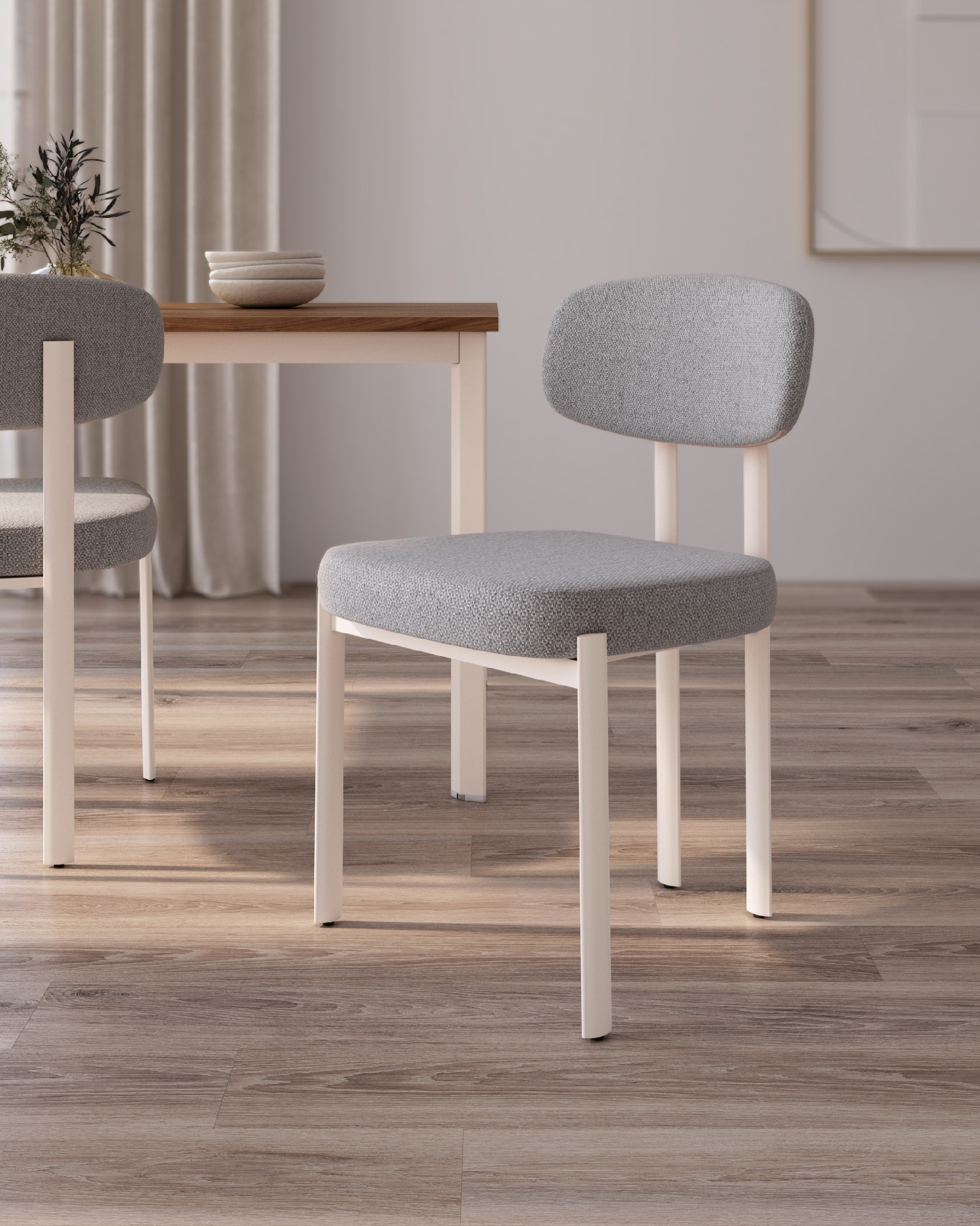 Pretoria chair with gray upholstery and ivory metal legs