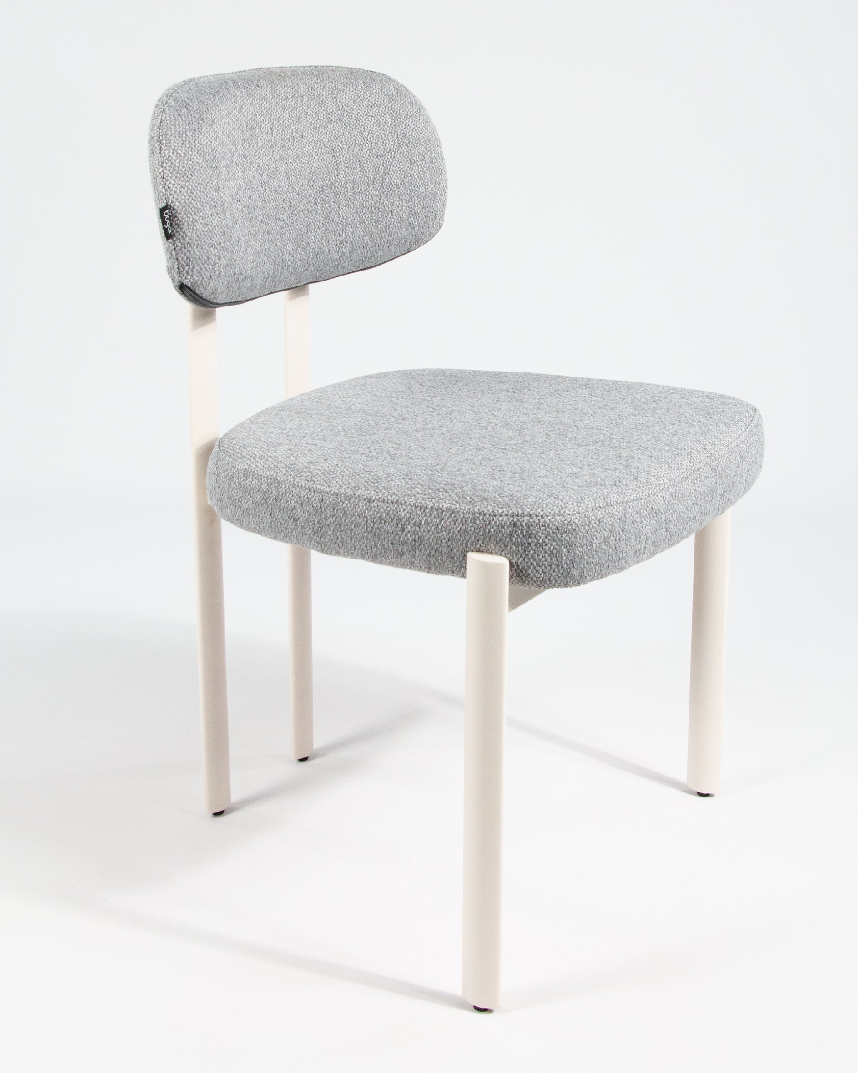 Pretoria chair with gray upholstery and ivory metal legs