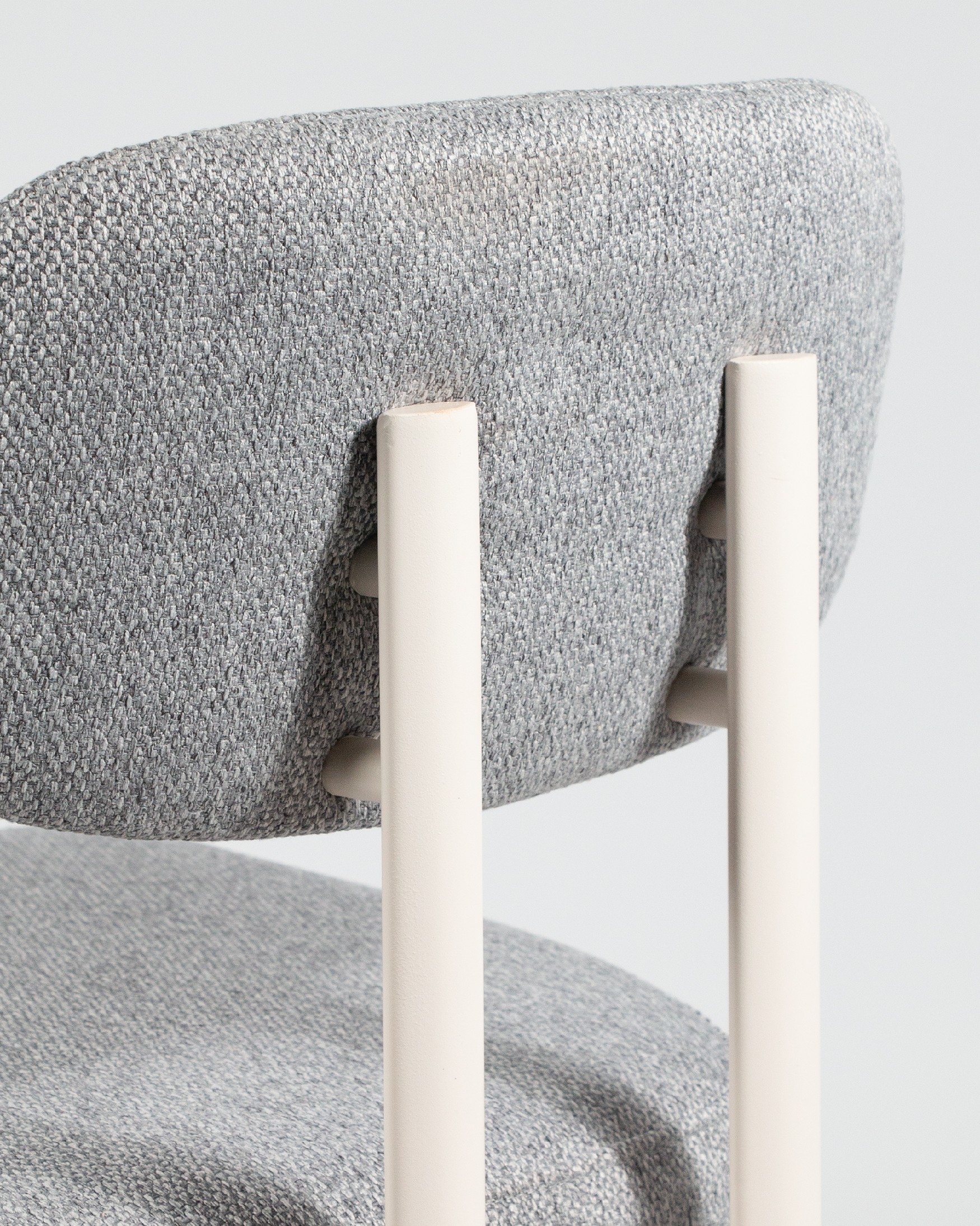 Pretoria chair with gray upholstery and ivory metal legs