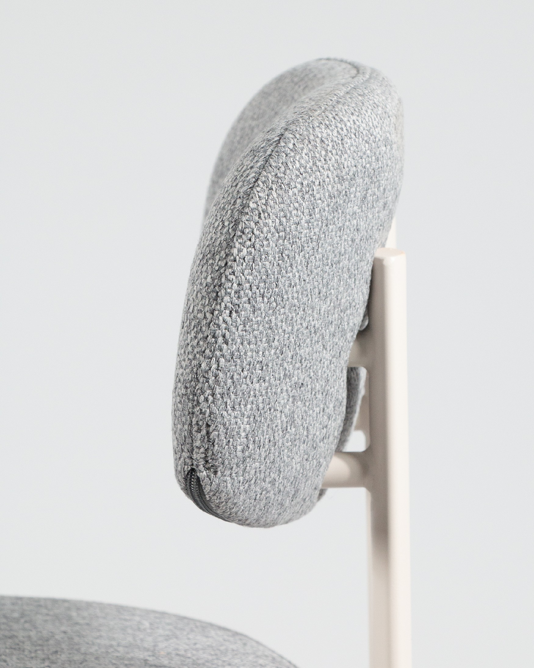 Pretoria chair with gray upholstery and ivory metal legs