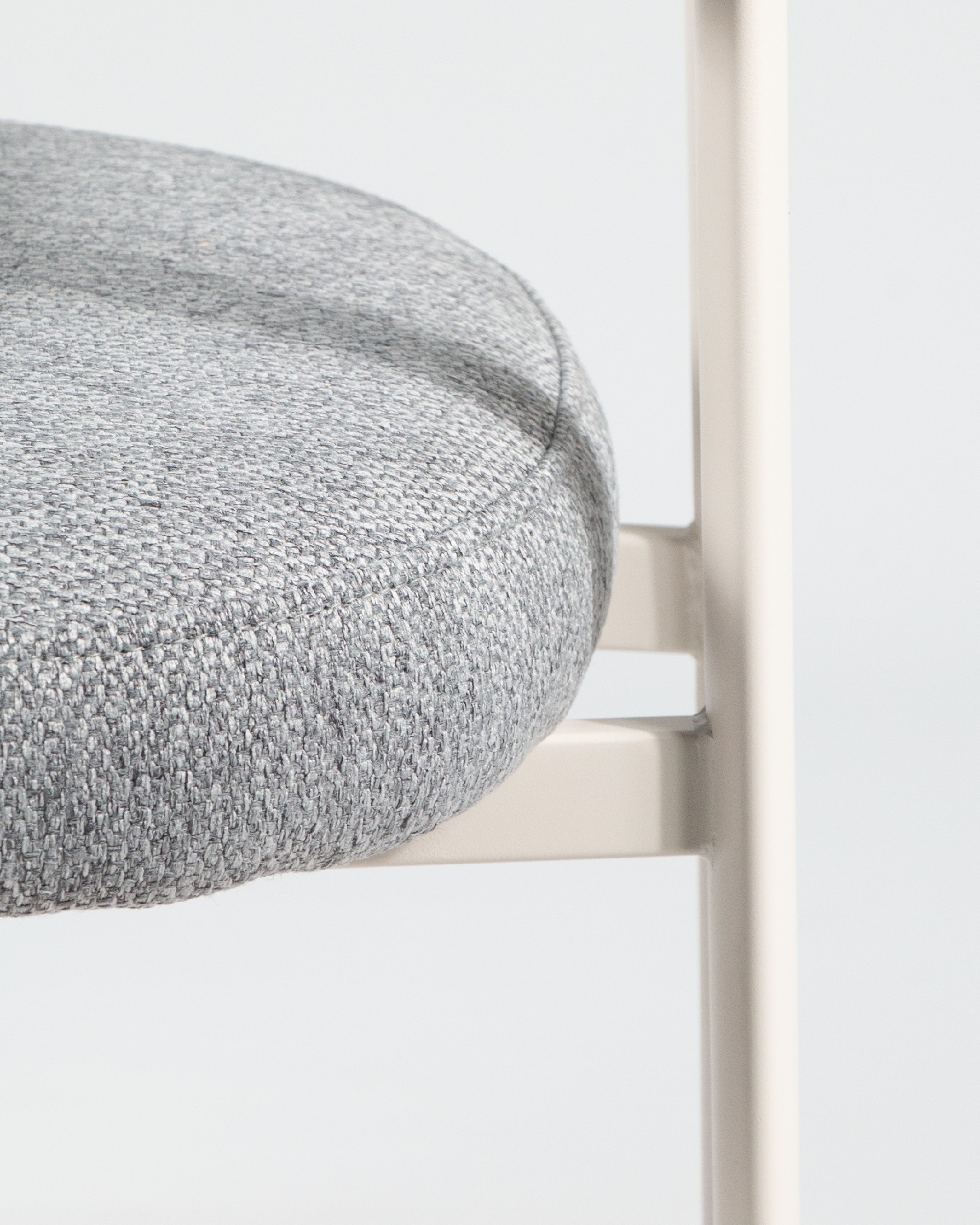 Pretoria chair with gray upholstery and ivory metal legs