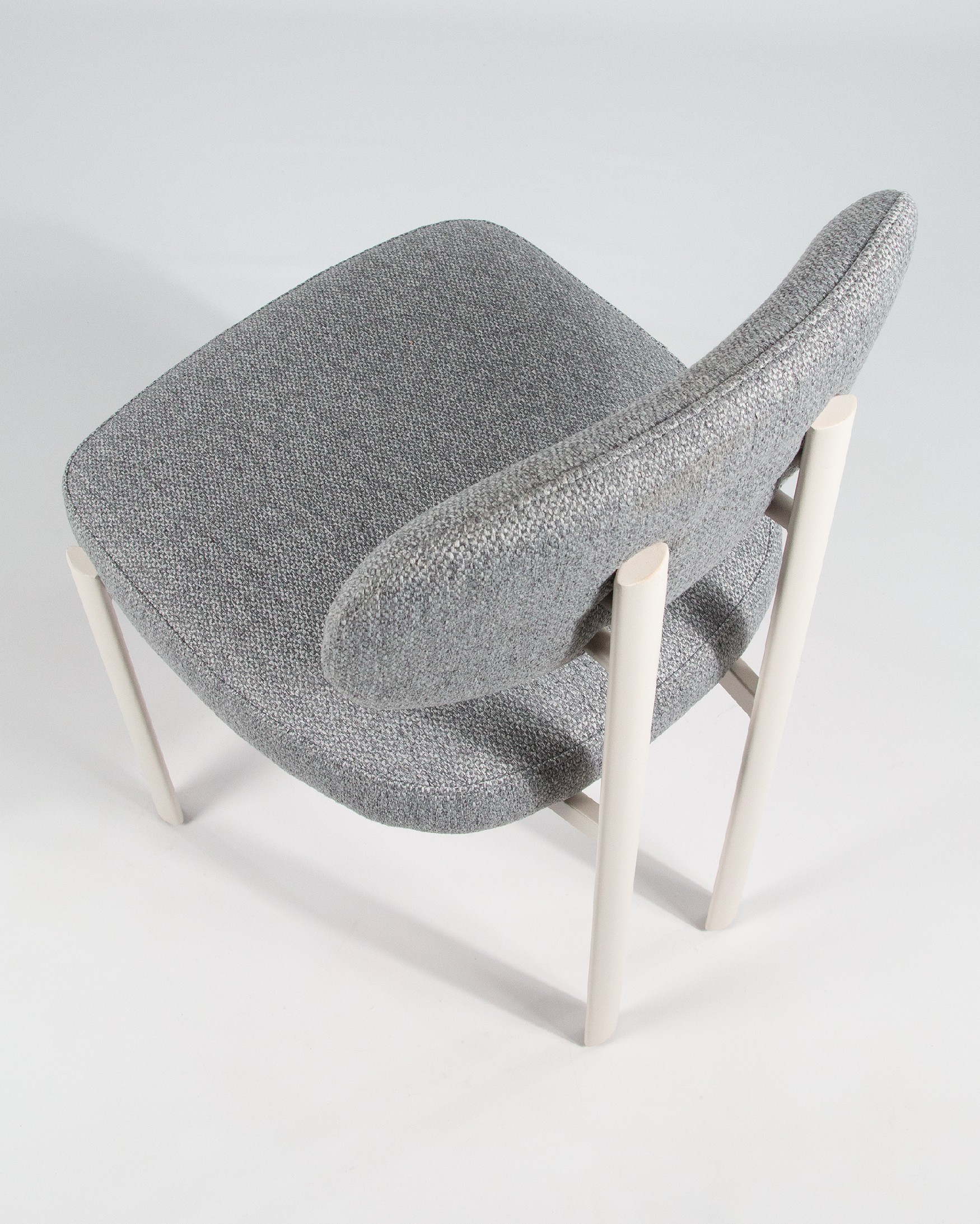 Pretoria chair with gray upholstery and ivory metal legs