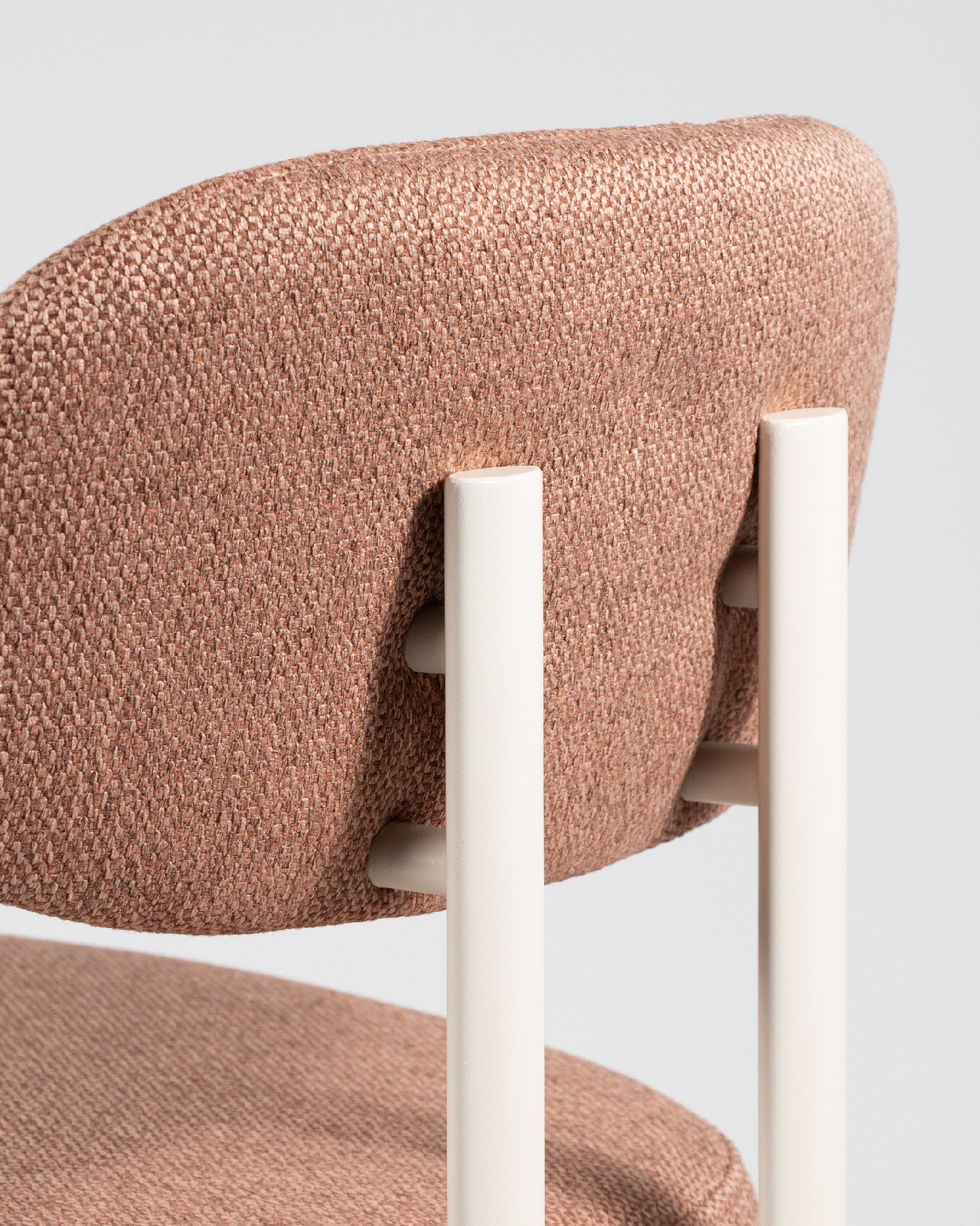 Pretoria chair with salmon upholstery and ivory metal legs
