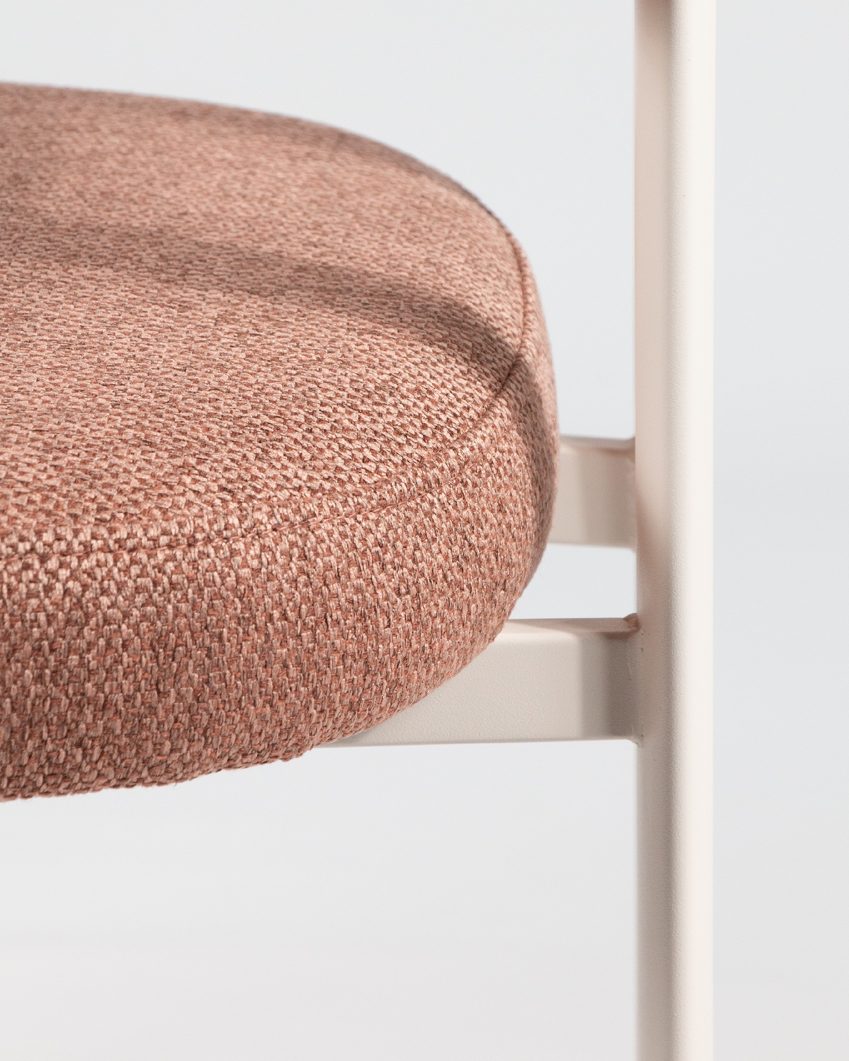 Pretoria chair with salmon upholstery and ivory metal legs
