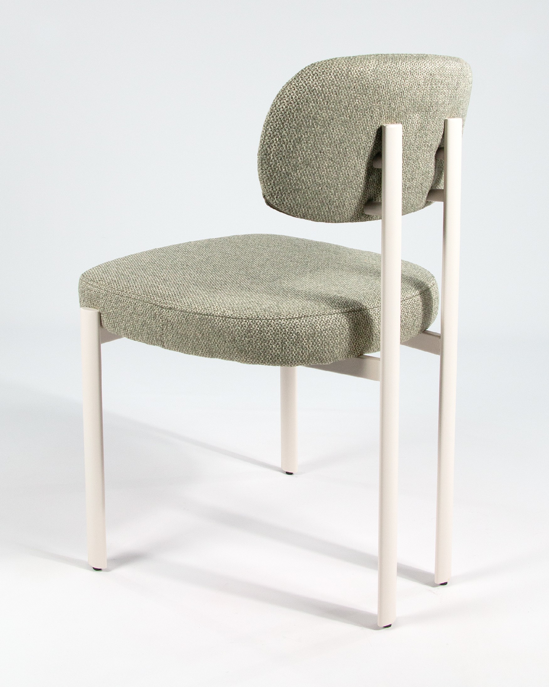 Pretoria chair with green upholstery and ivory metal legs