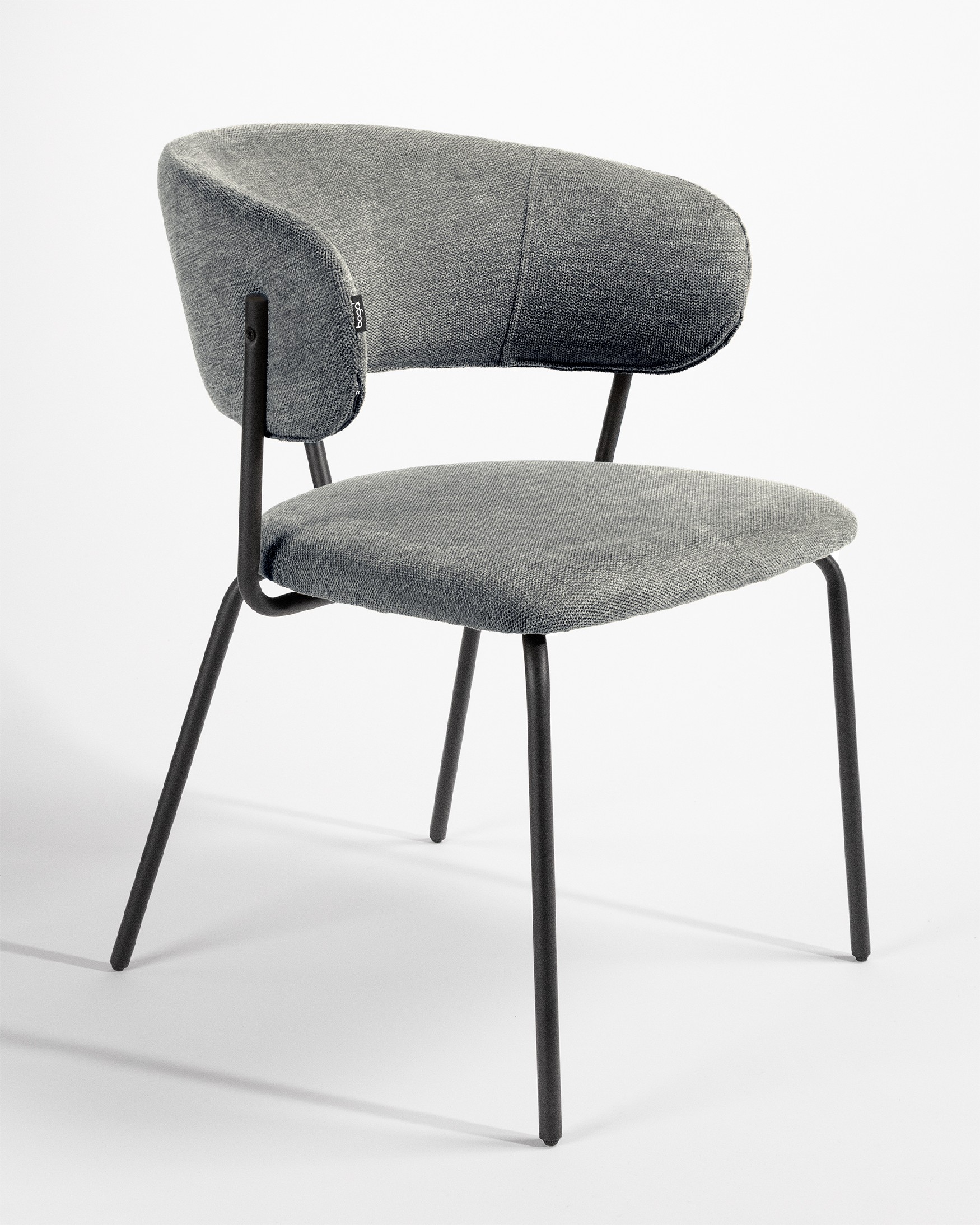 Quebec chair with gray upholstery and black metal legs