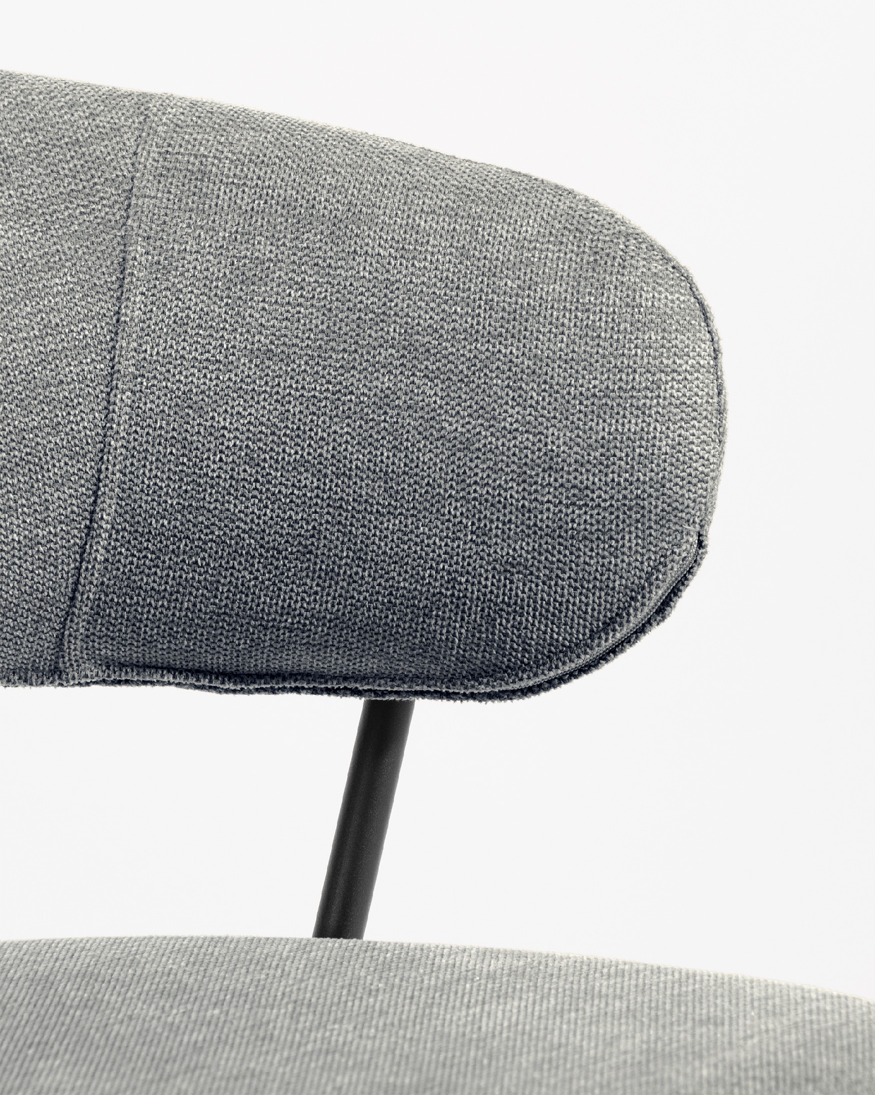 Quebec chair with gray upholstery and black metal legs