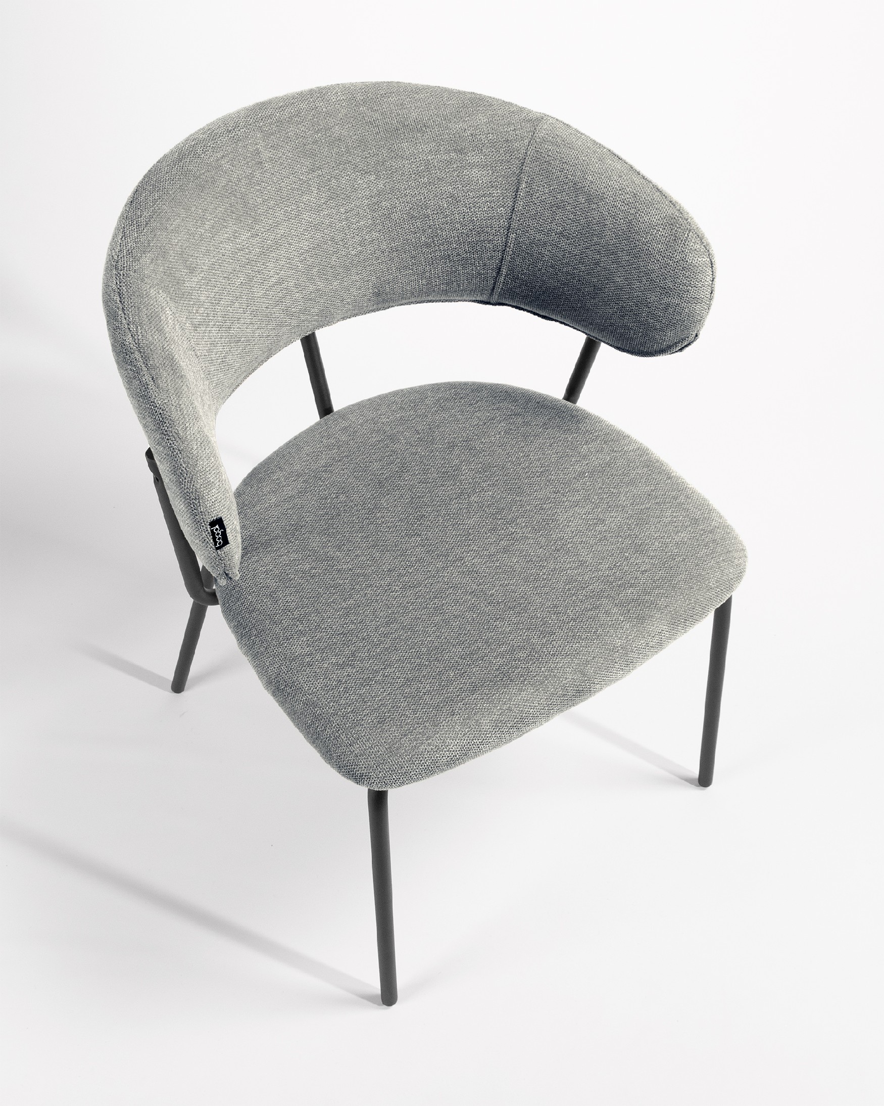 Quebec chair with gray upholstery and black metal legs