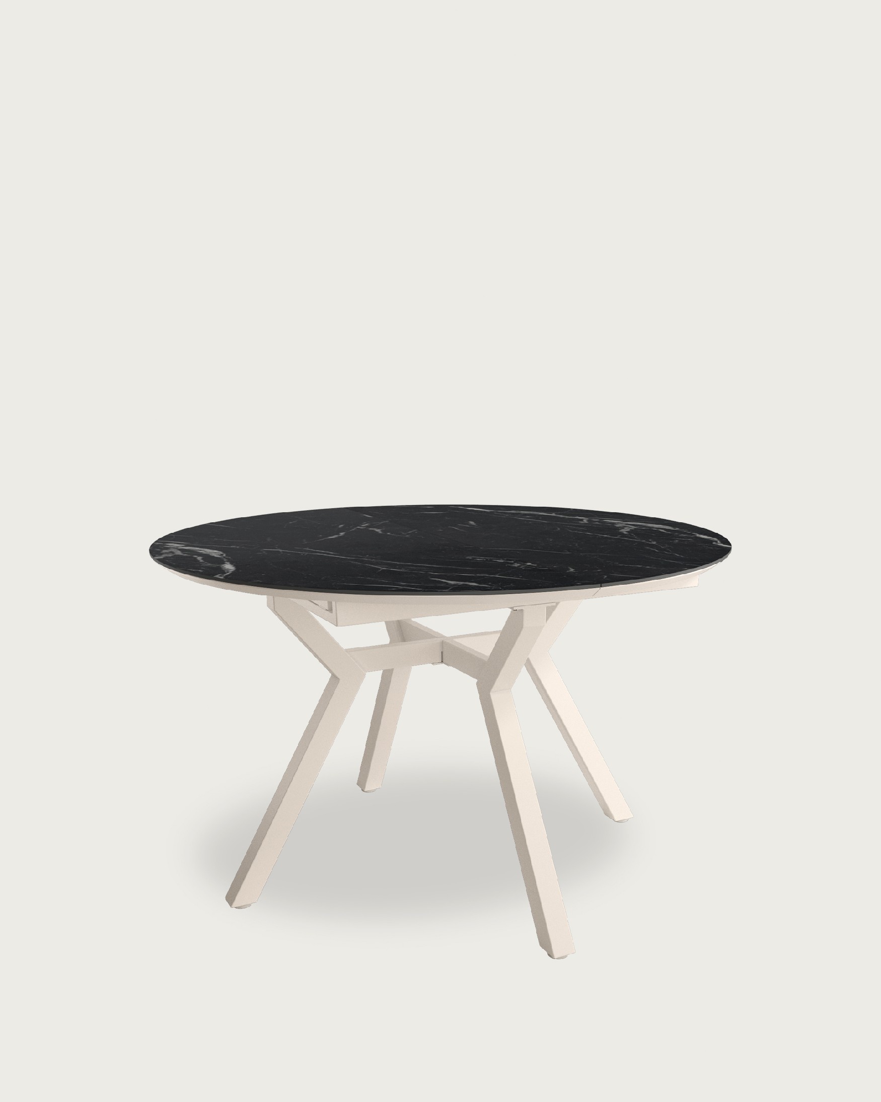 Mesa Ross redonda extensible con acabado porclánico Marquina y pata metálica marfil  120/160 x 120 cm