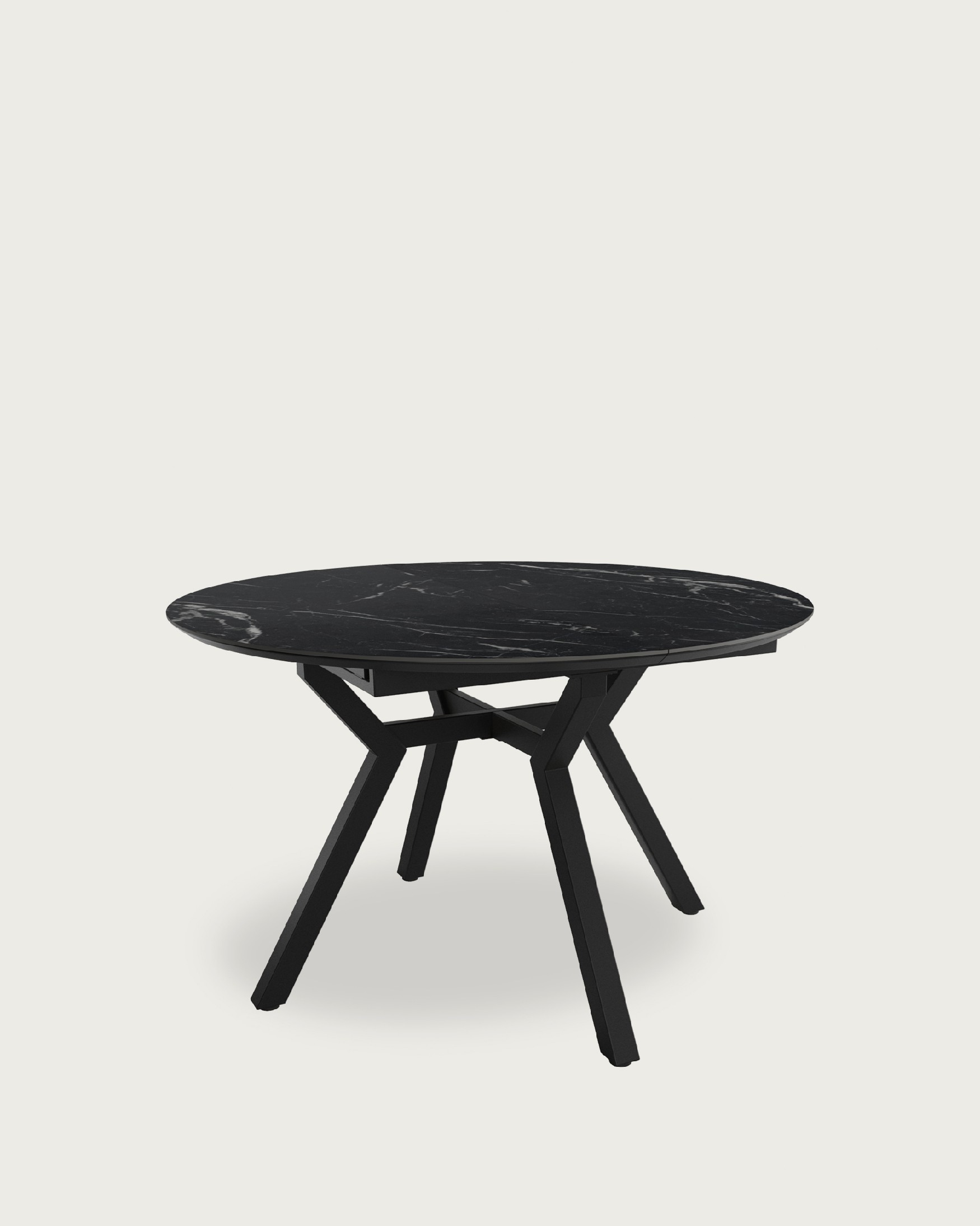 Round extendable Ross table with  porcelain Marquina finish and black metal leg 100/130 x 100 cm