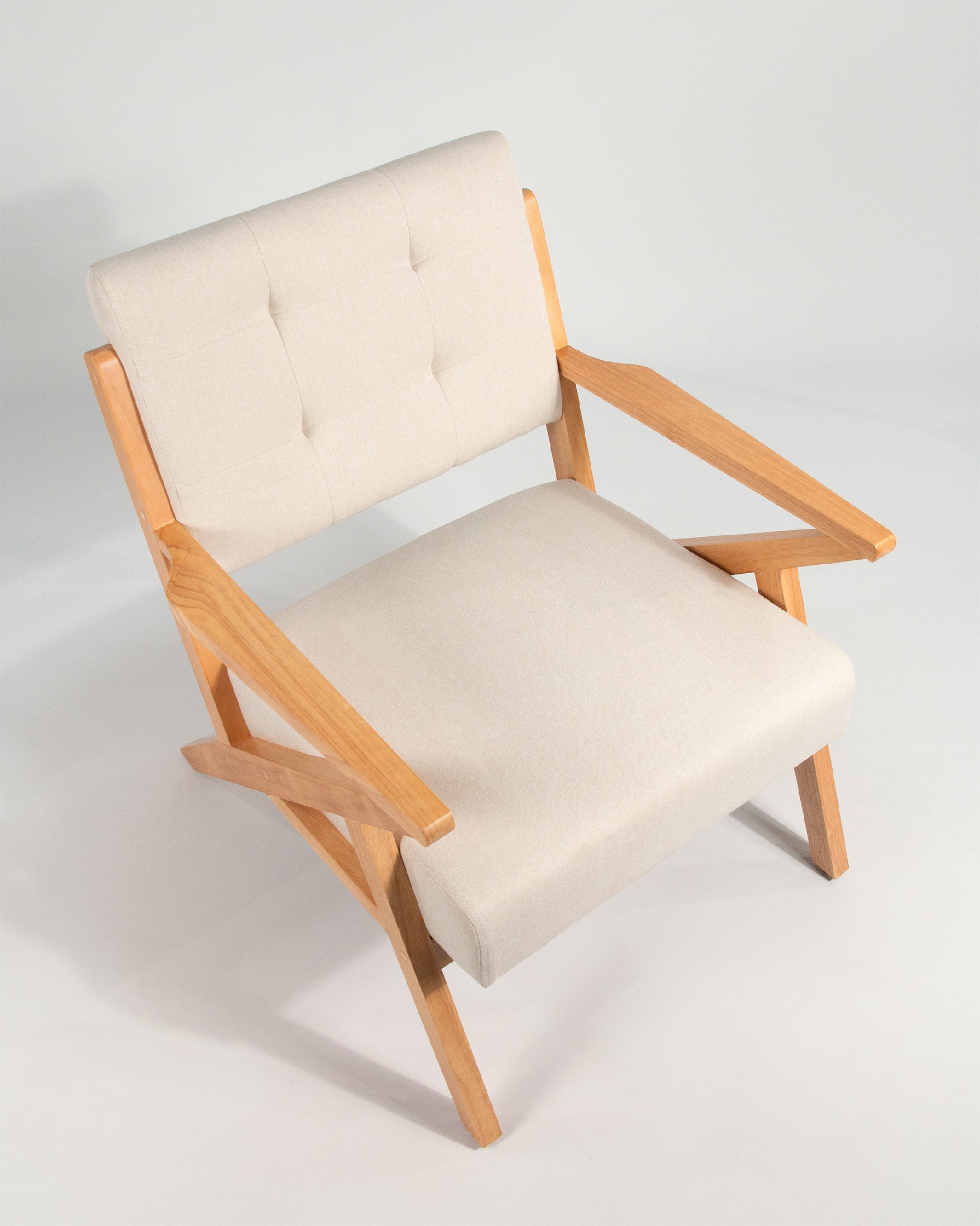 Sakura armchair with sand upholstery and light wood finish