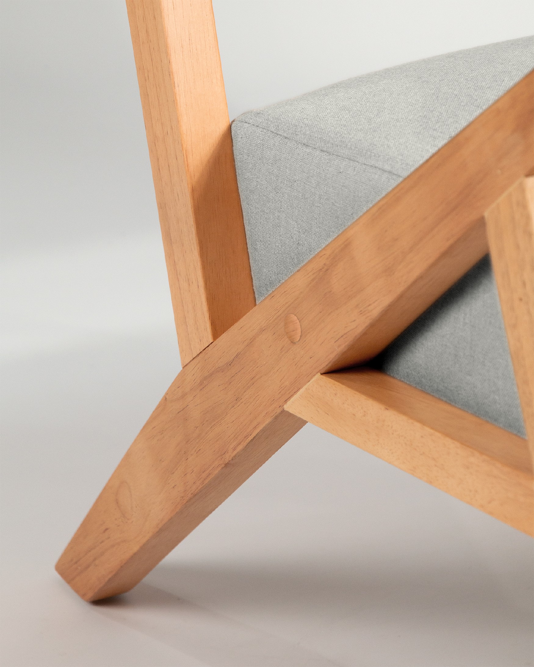 Sakura armchair with gray upholstery and light wood finish