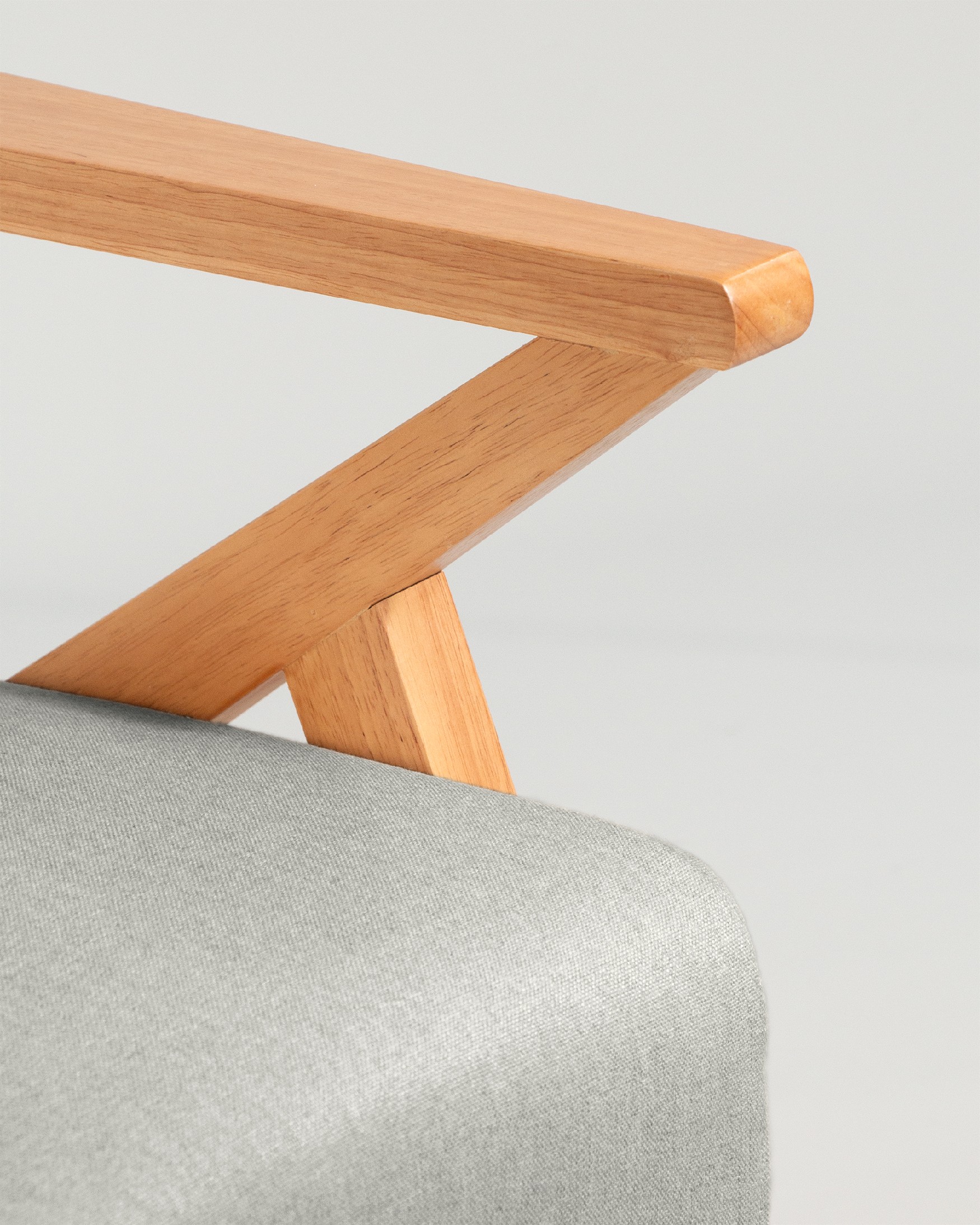 Sakura armchair with gray upholstery and light wood finish