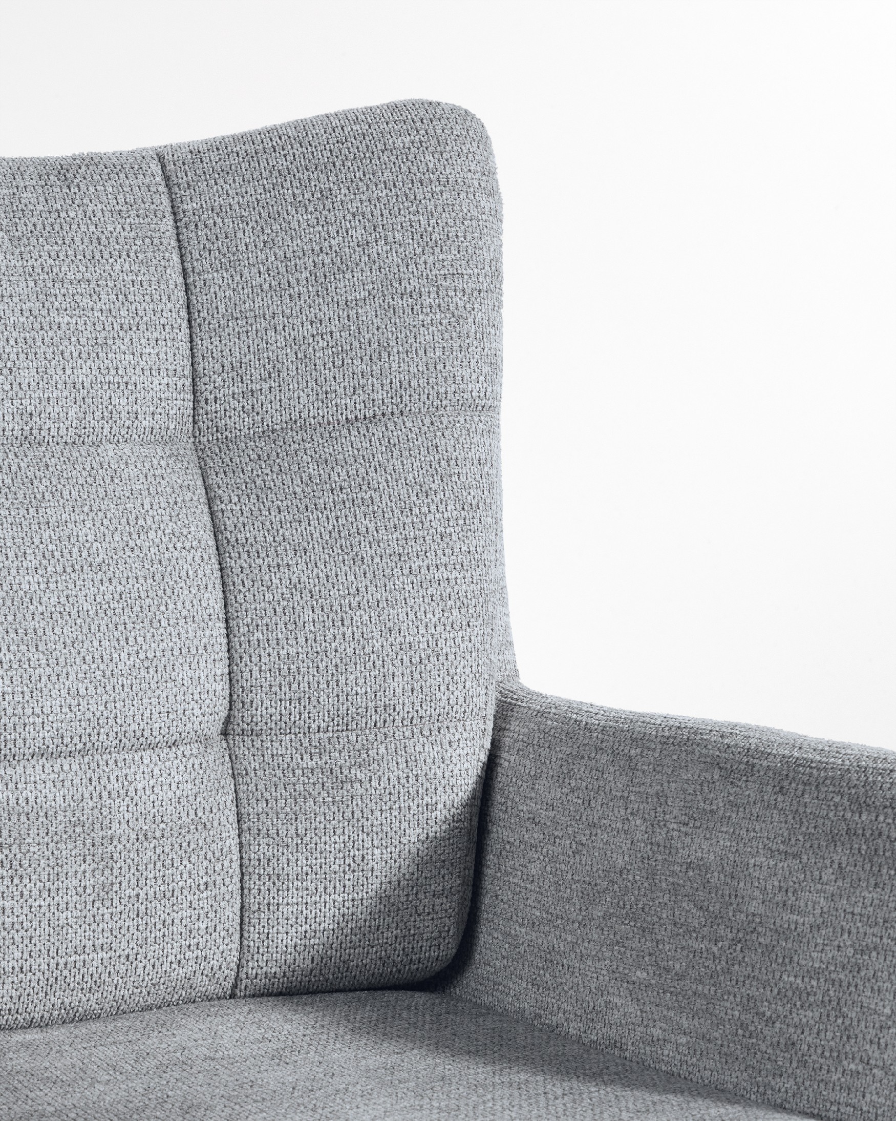 Silla Salta giratoria 360º con función return, tapizado gris y patas metálicas negras