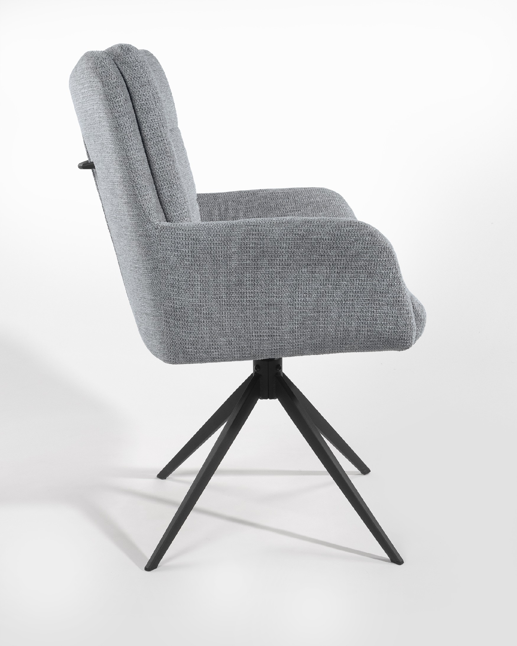 Silla Salta giratoria 360º con función return, tapizado gris y patas metálicas negras
