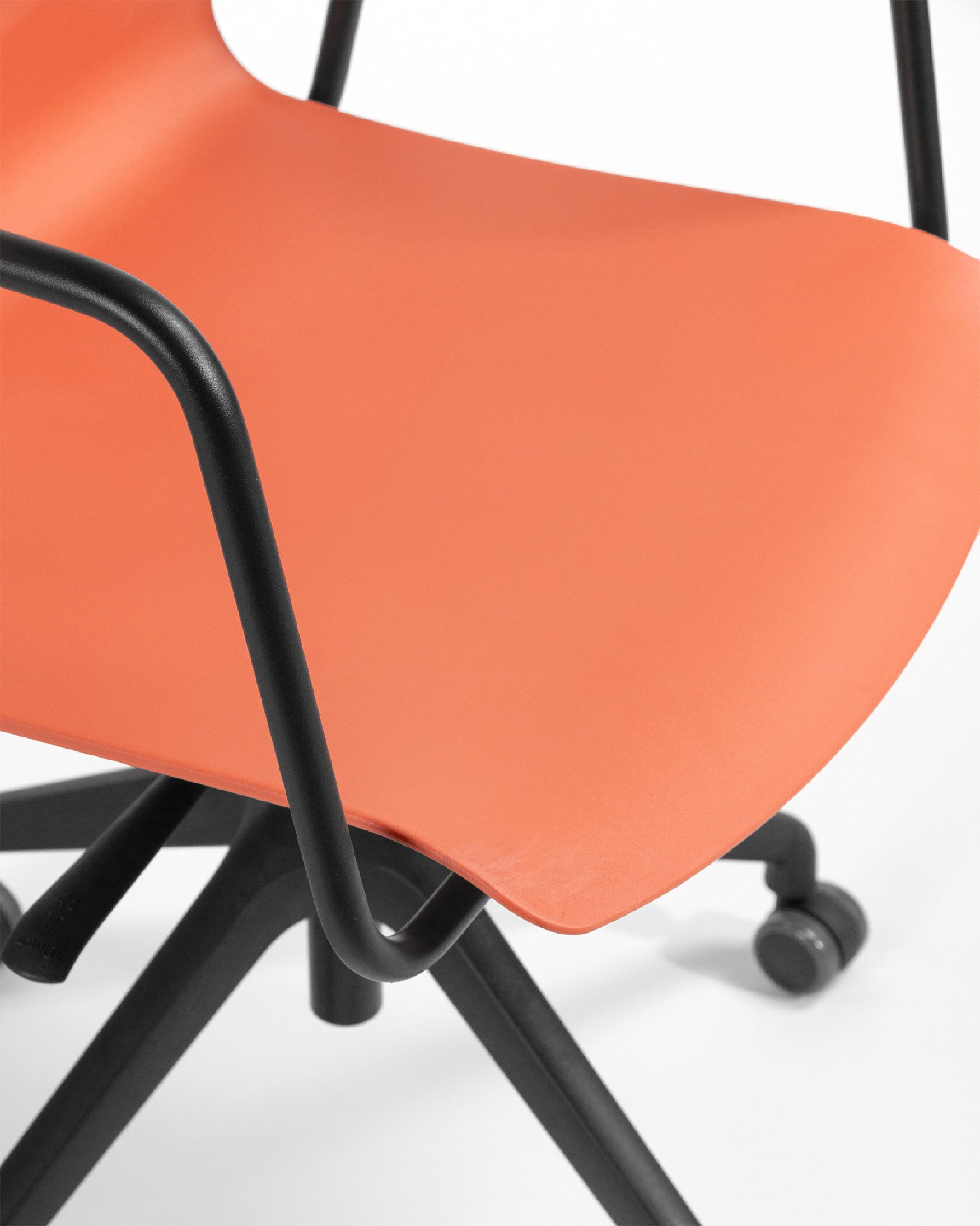 Coral polypropylene Seattle desk chair with black legs