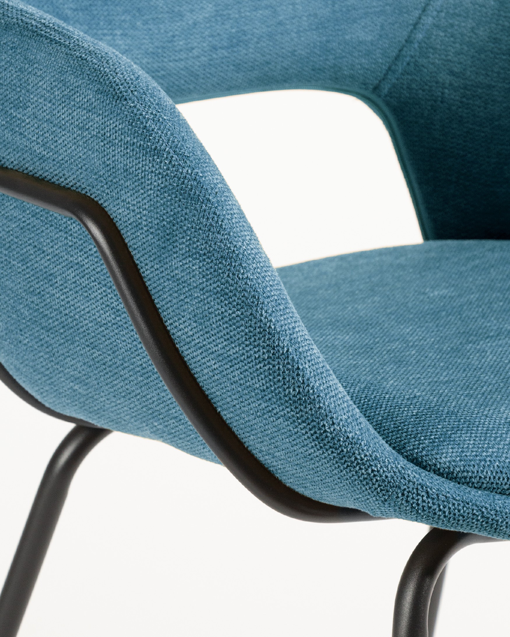 Sidney chair with blue upholstery and black metal legs