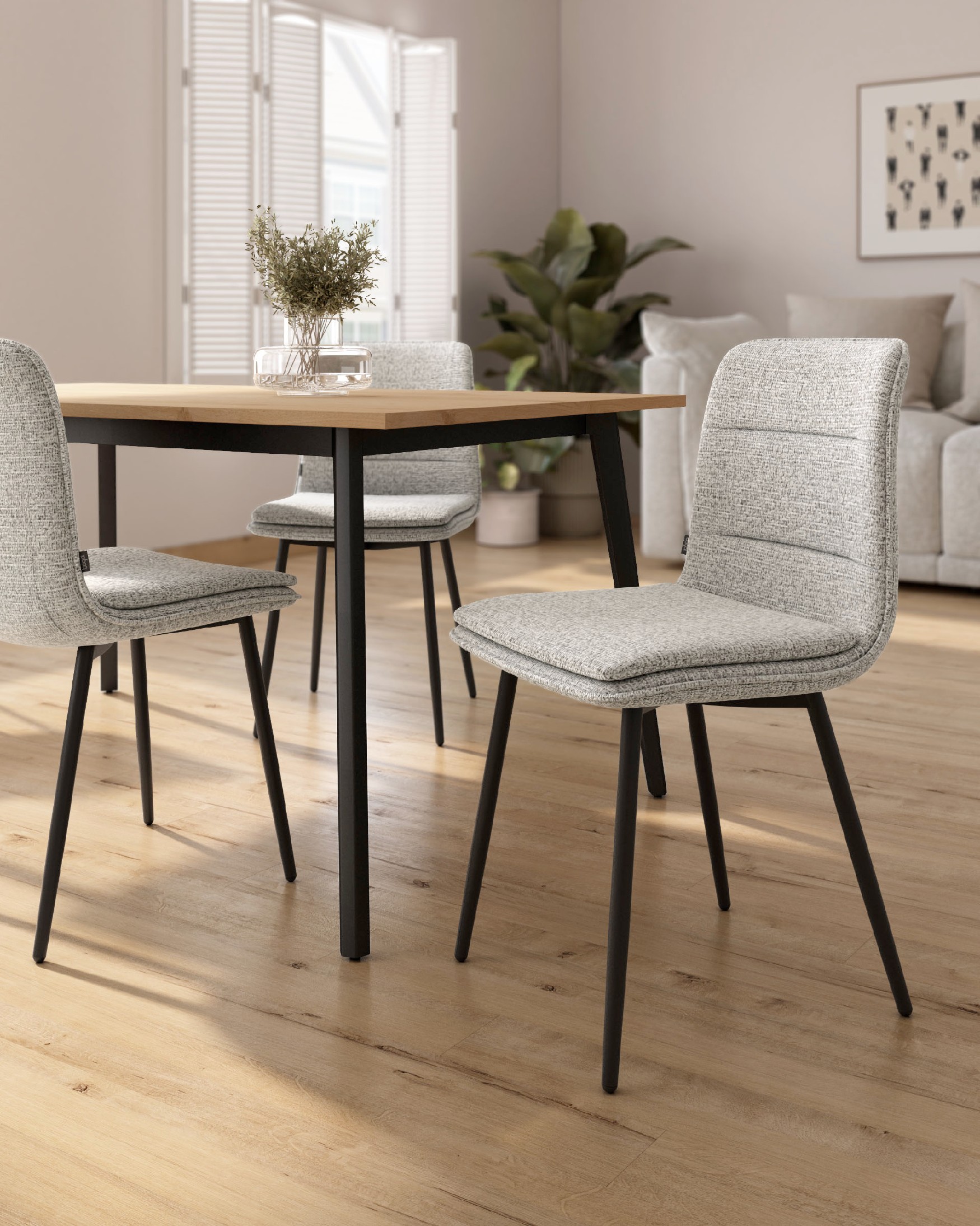 Chaise Sintra avec rembourrage marbré et pieds métalliques noirs