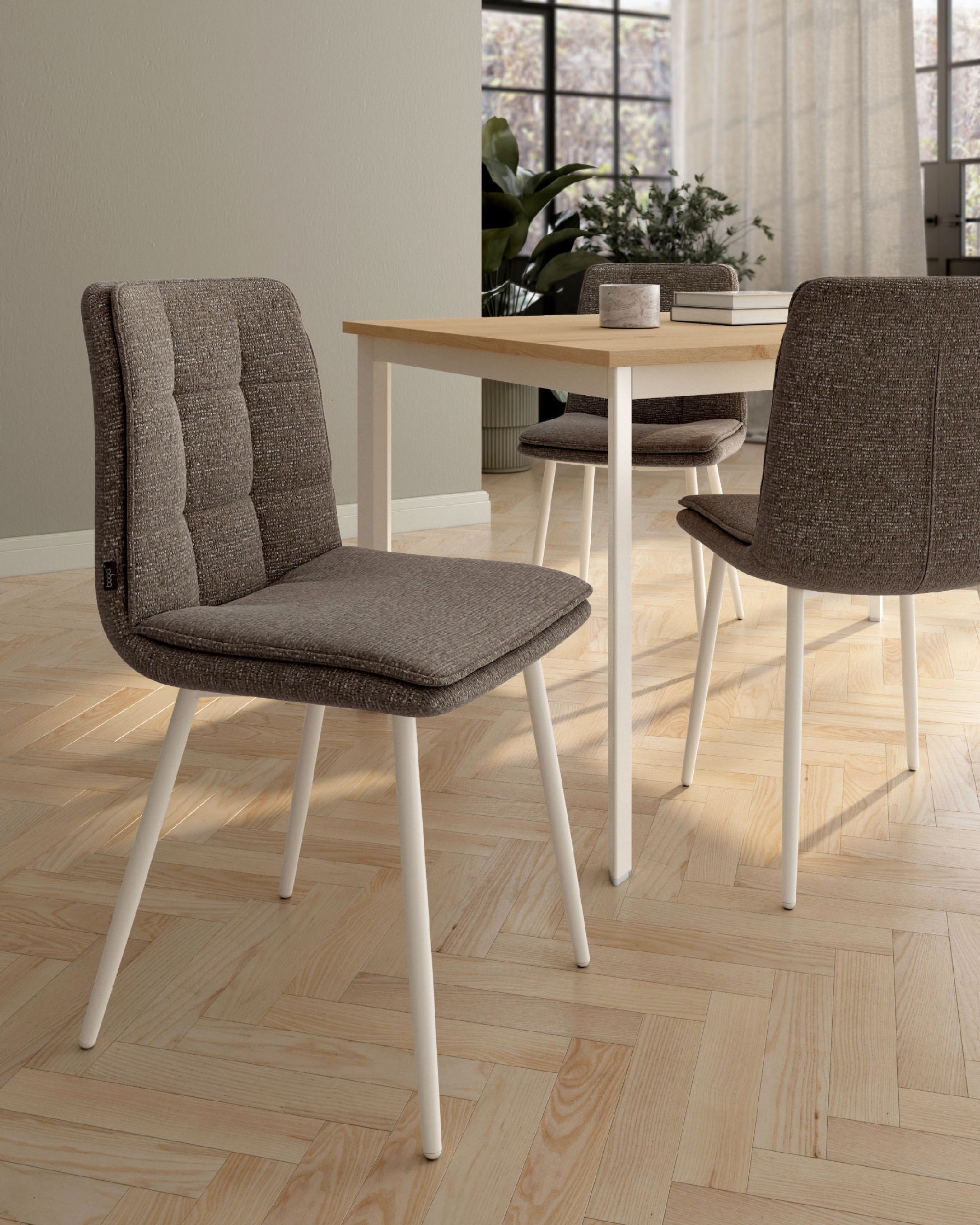 Silla Torino con tapizado antracita y patas metálicas marfil