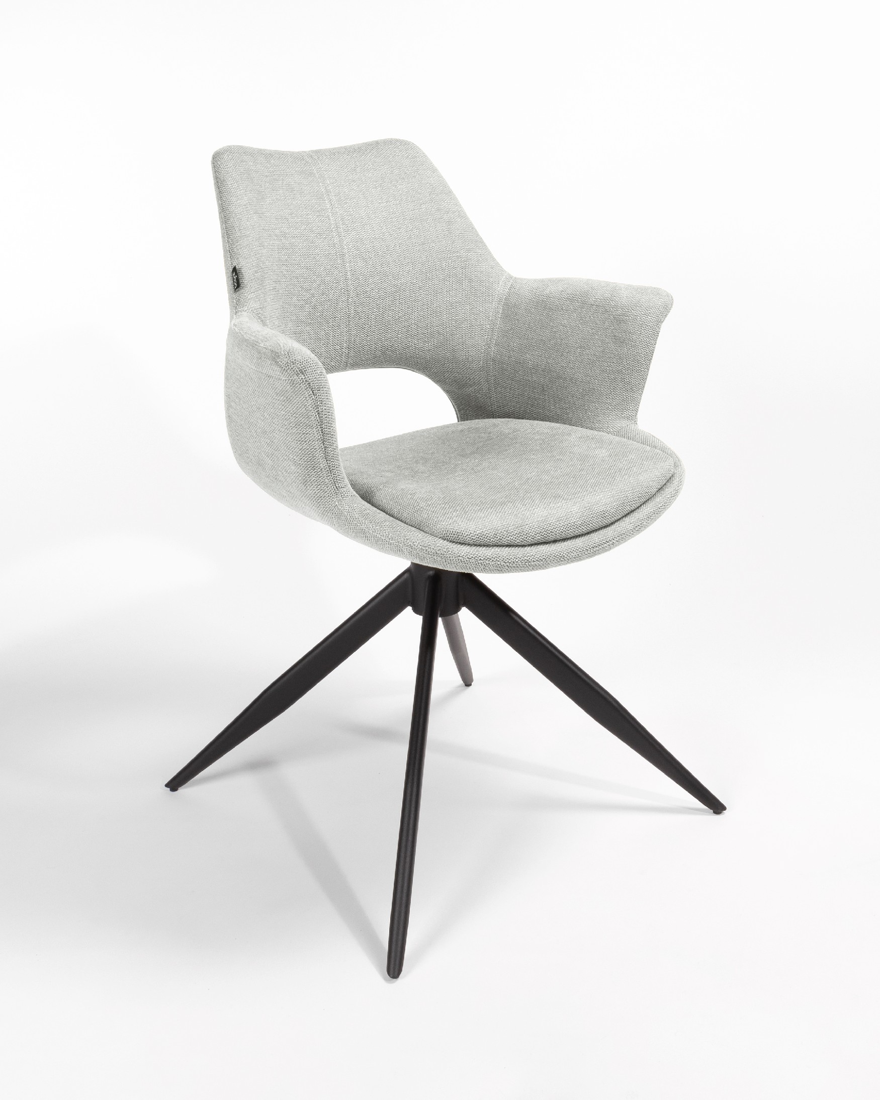Silla Toronto con tapizado gris claro y patas metálicas negras, giratoria 360°