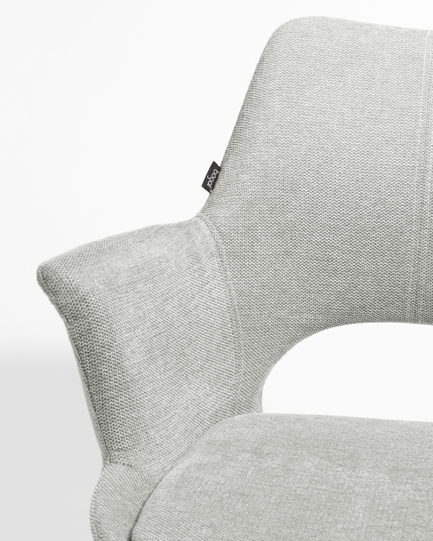 Silla Toronto con tapizado gris claro y patas metálicas negras, giratoria 360°