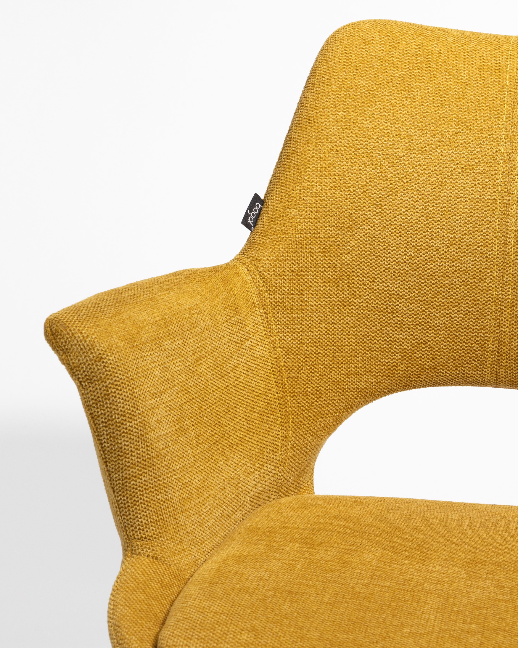 Chaise Toronto avec revêtement moutarde et pieds métalliques noirs, pivotante à 360°