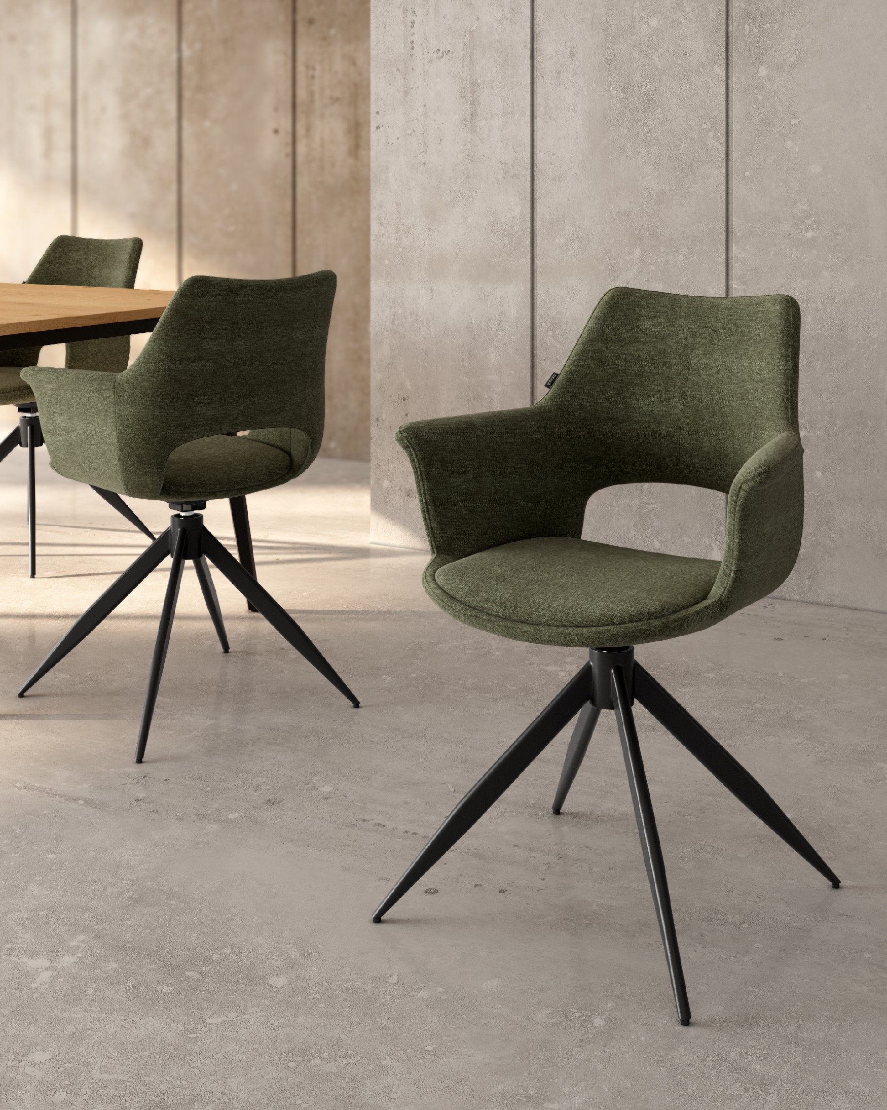 Toronto chair with green upholstery and black metal legs, 360° swivel