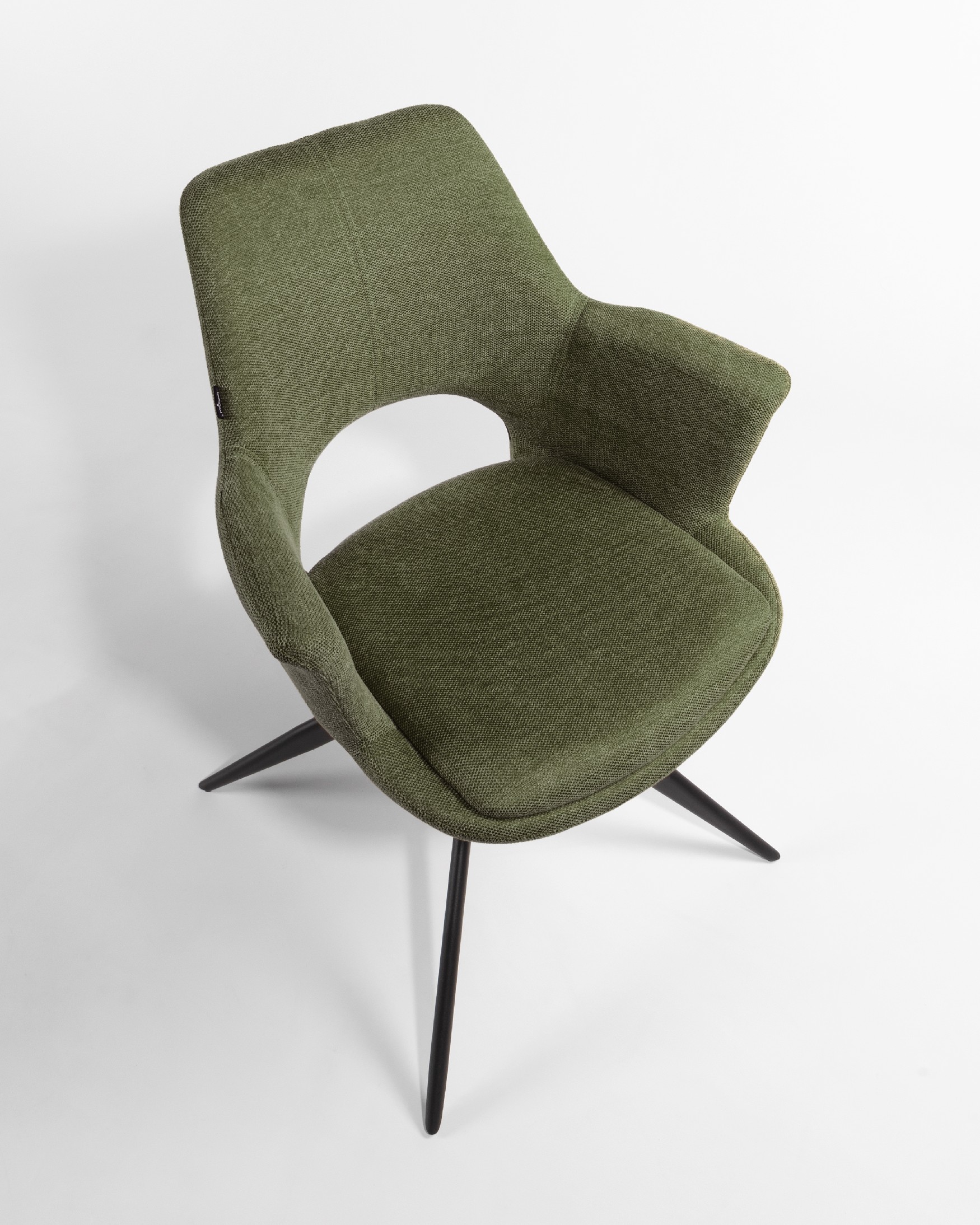 Toronto chair with green upholstery and black metal legs, 360° swivel