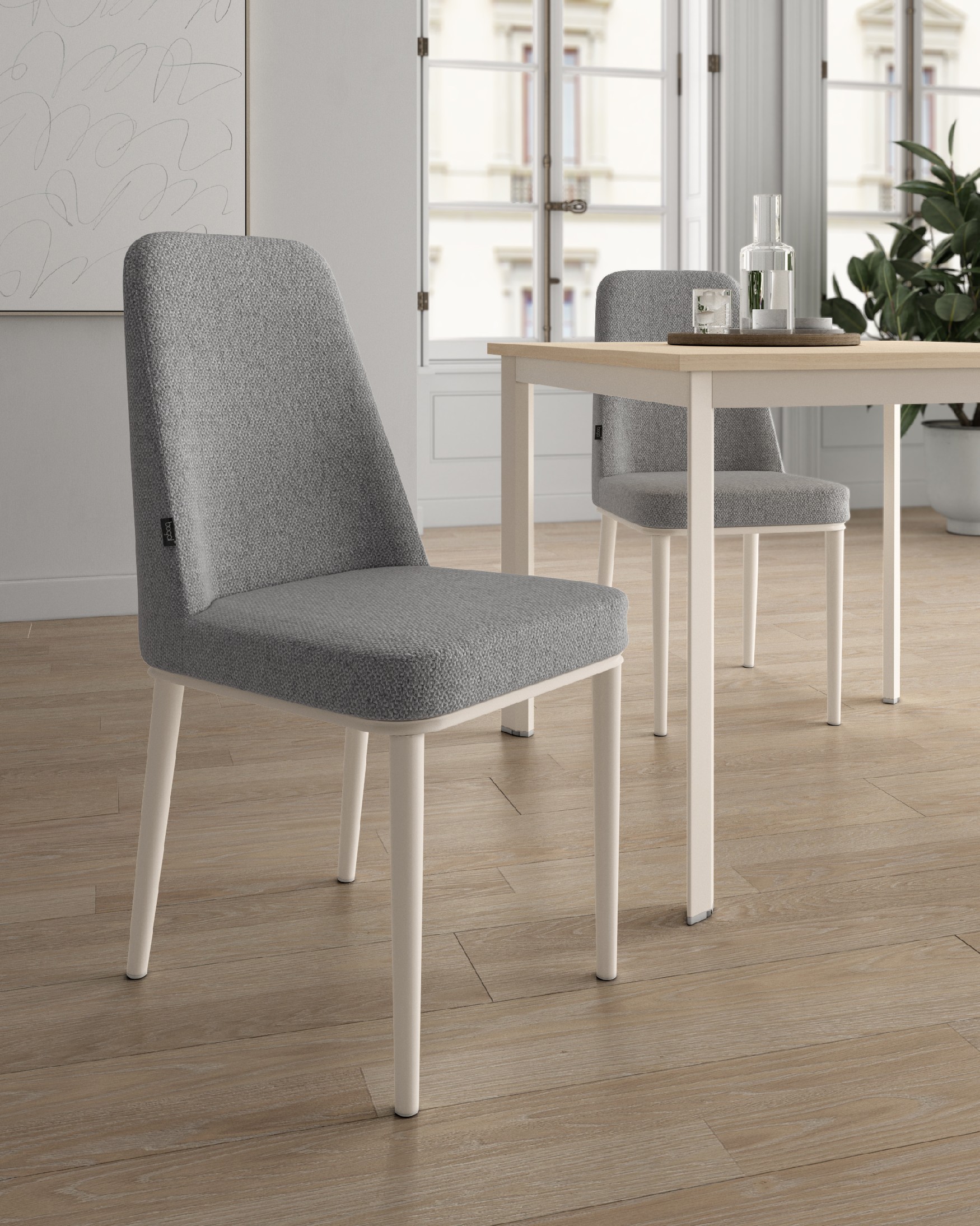 Tromso chair with gray upholstery and ivory metal legs