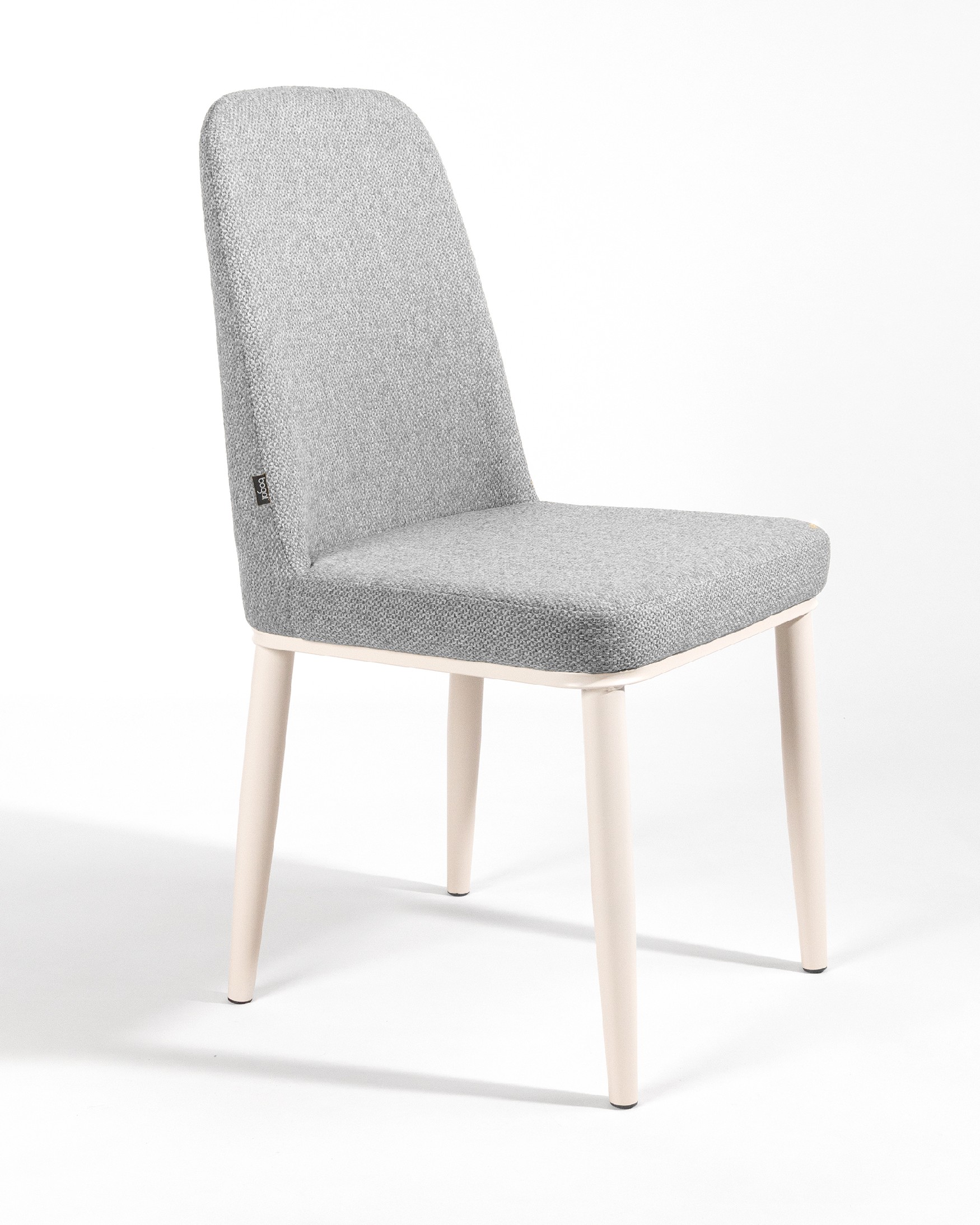 Tromso chair with gray upholstery and ivory metal legs