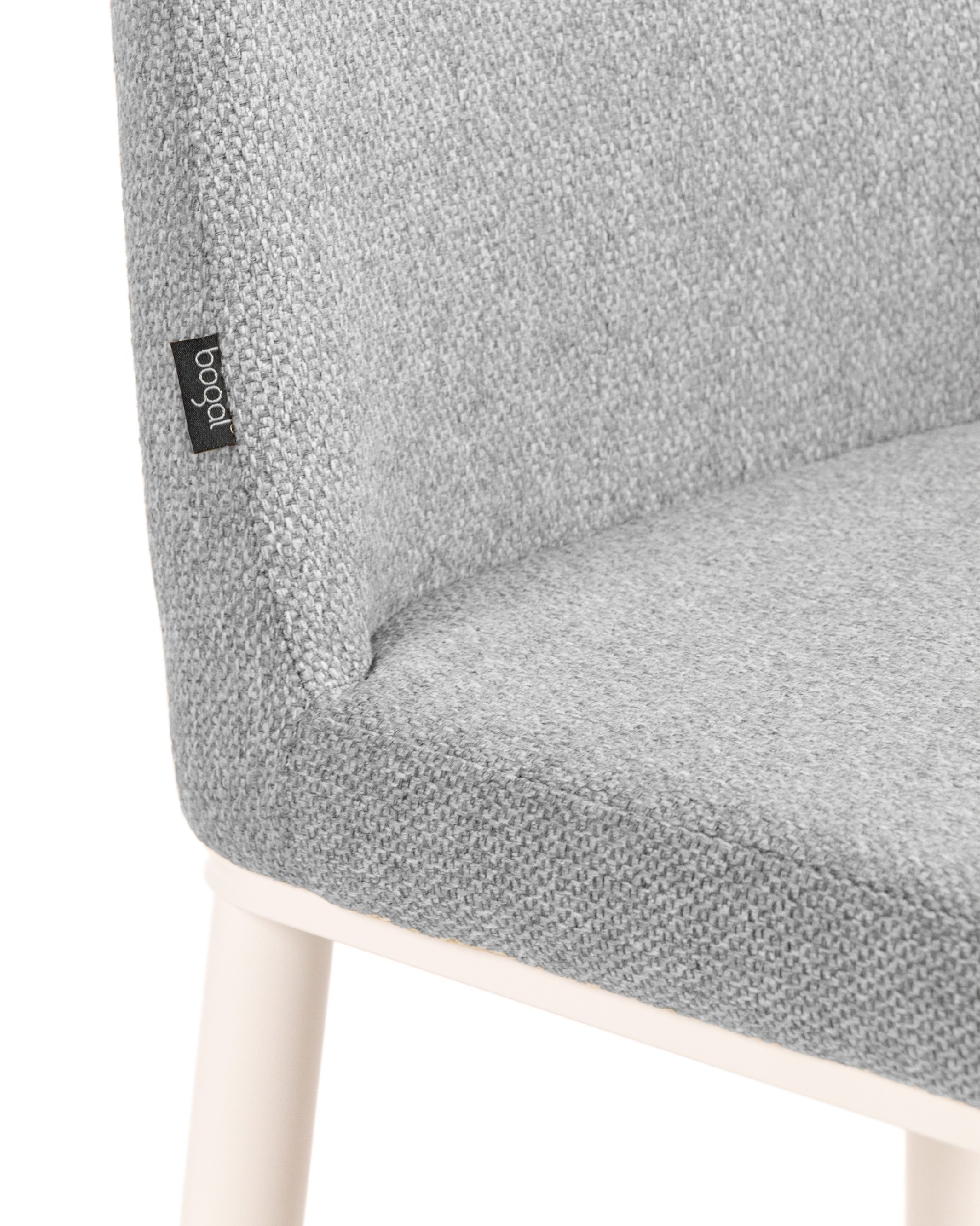 Tromso chair with gray upholstery and ivory metal legs