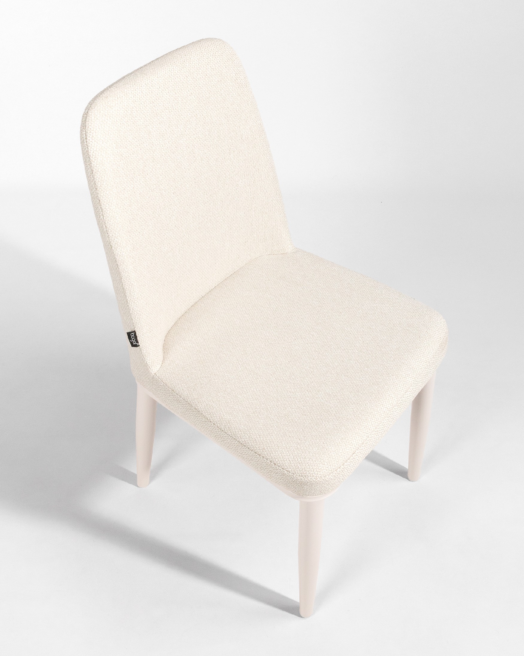 Chaise Tromso avec tapisserie en nacre et pieds métalliques ivoire