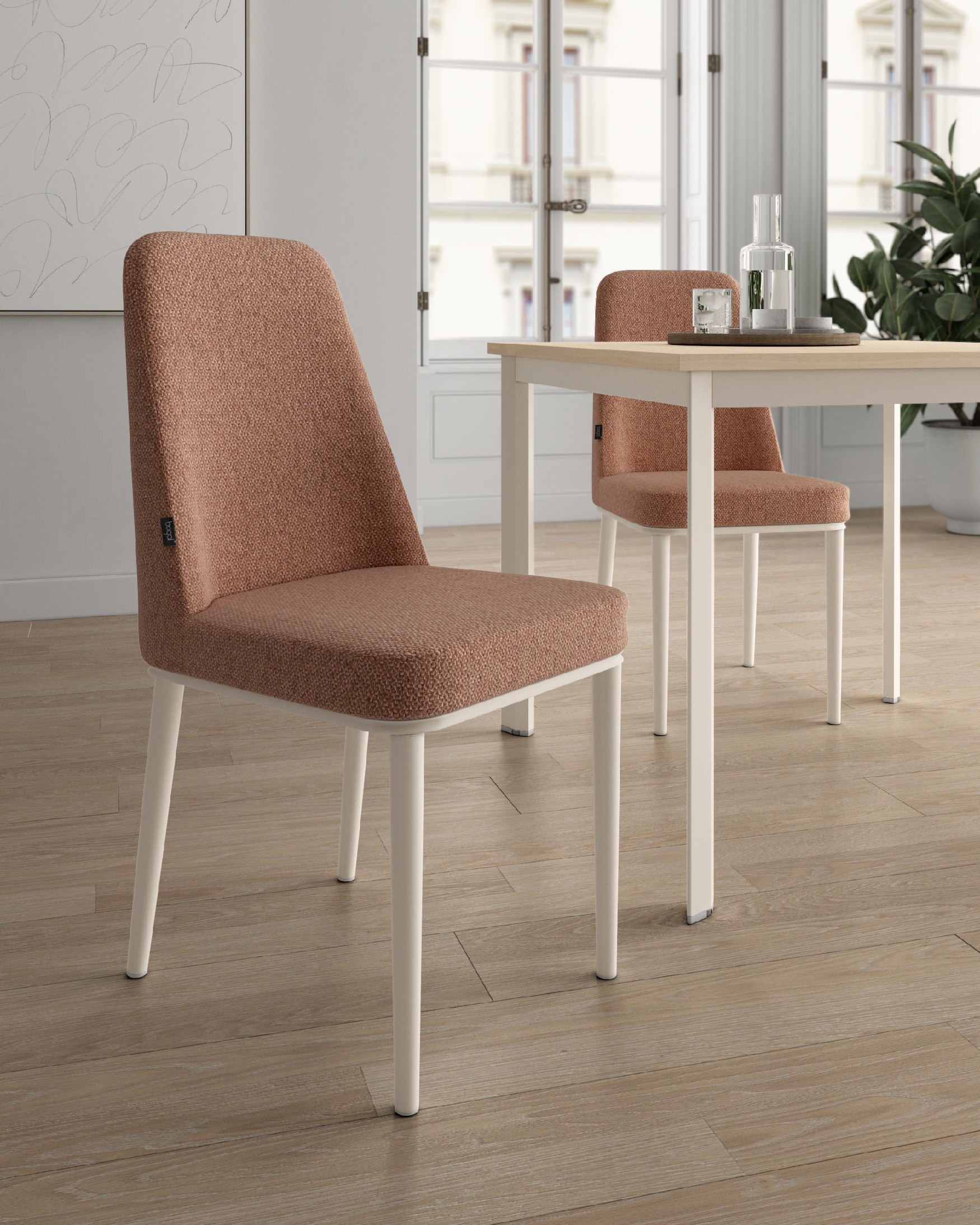 Tromso chair with salmon upholstery and ivory metal legs