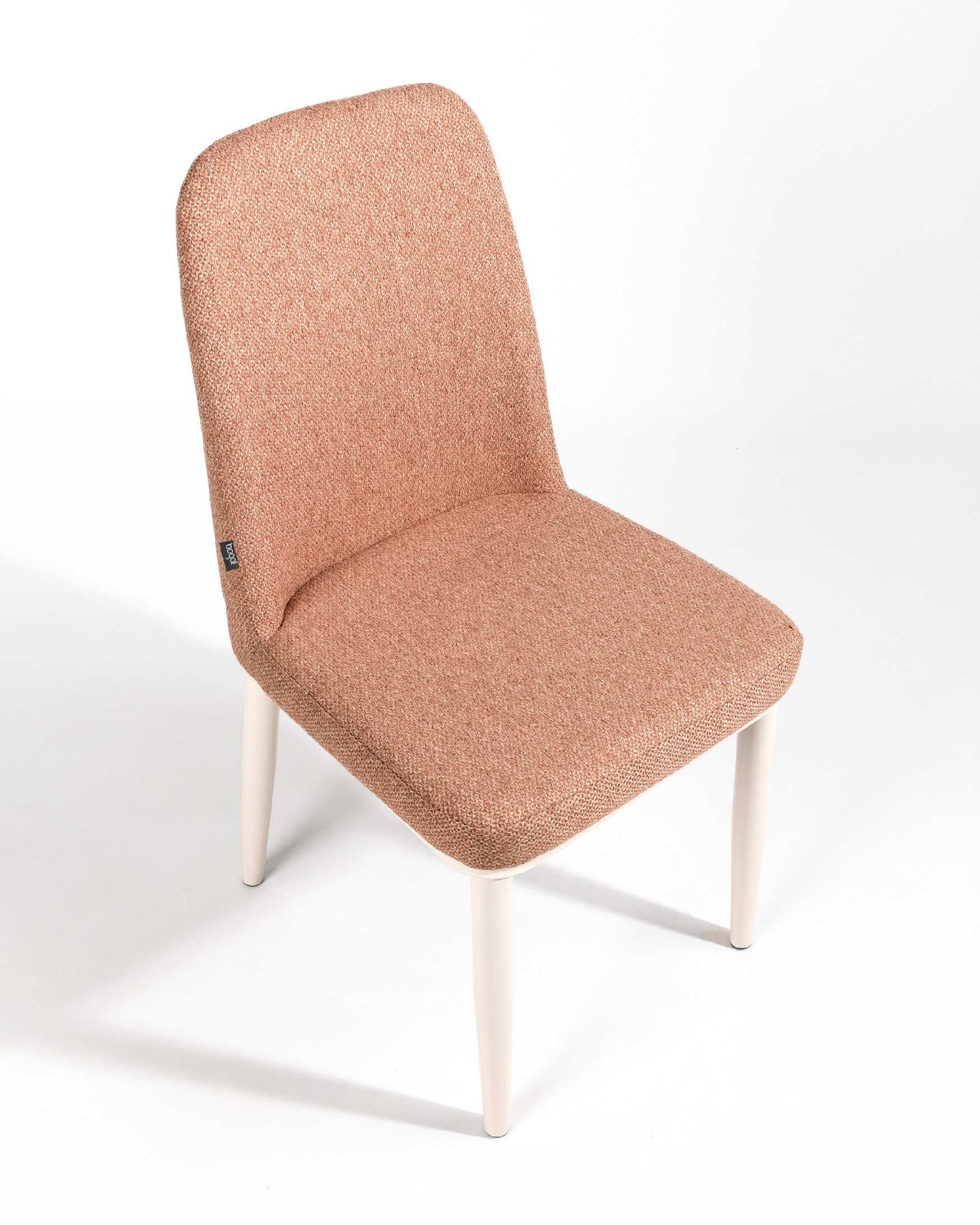 Tromso chair with salmon upholstery and ivory metal legs