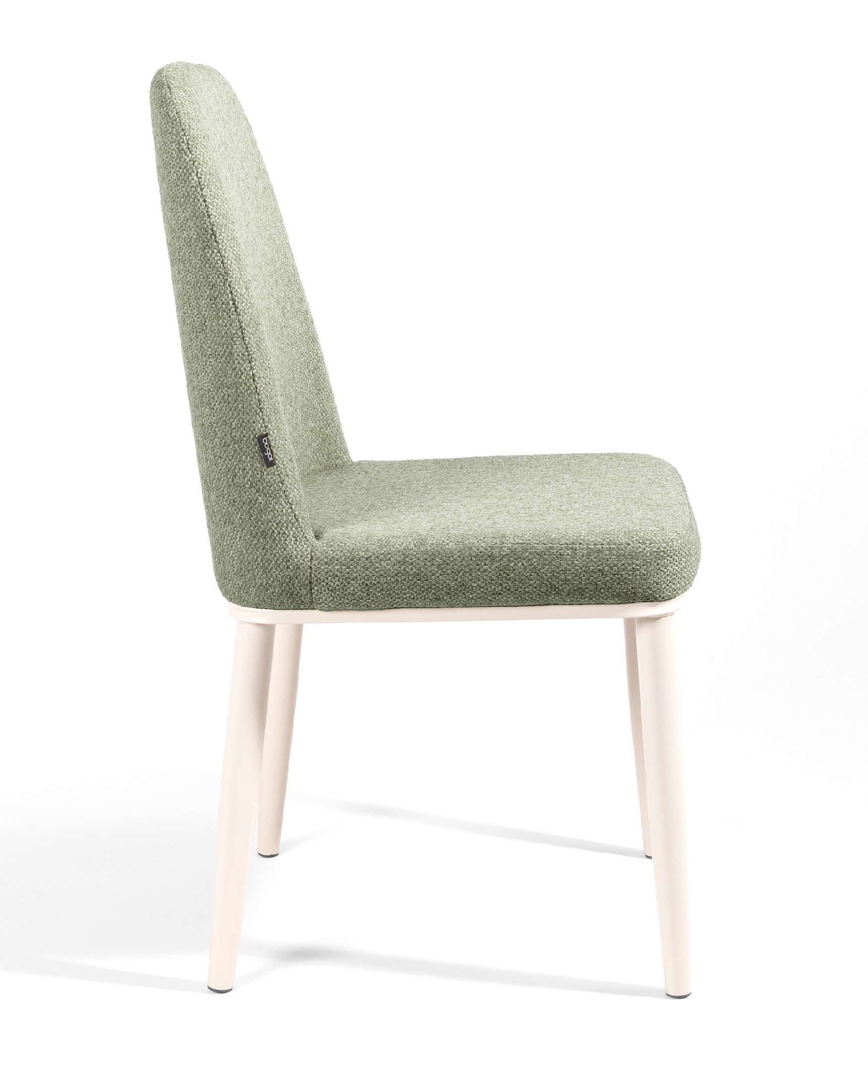 Tromso chair with green upholstery and ivory metal legs