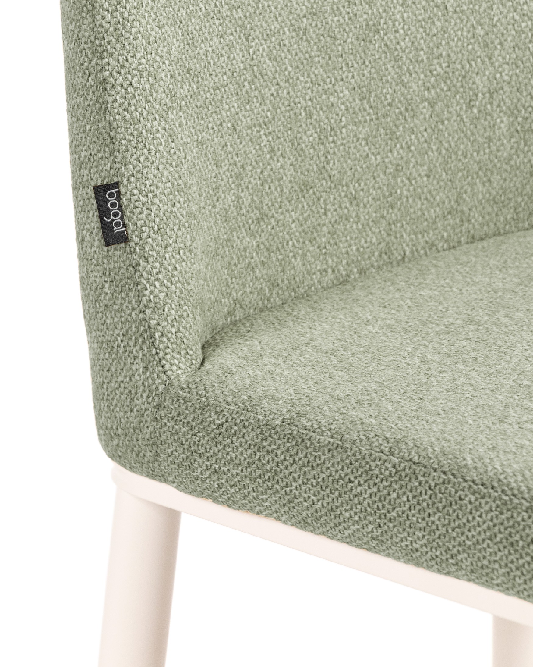 Tromso chair with green upholstery and ivory metal legs