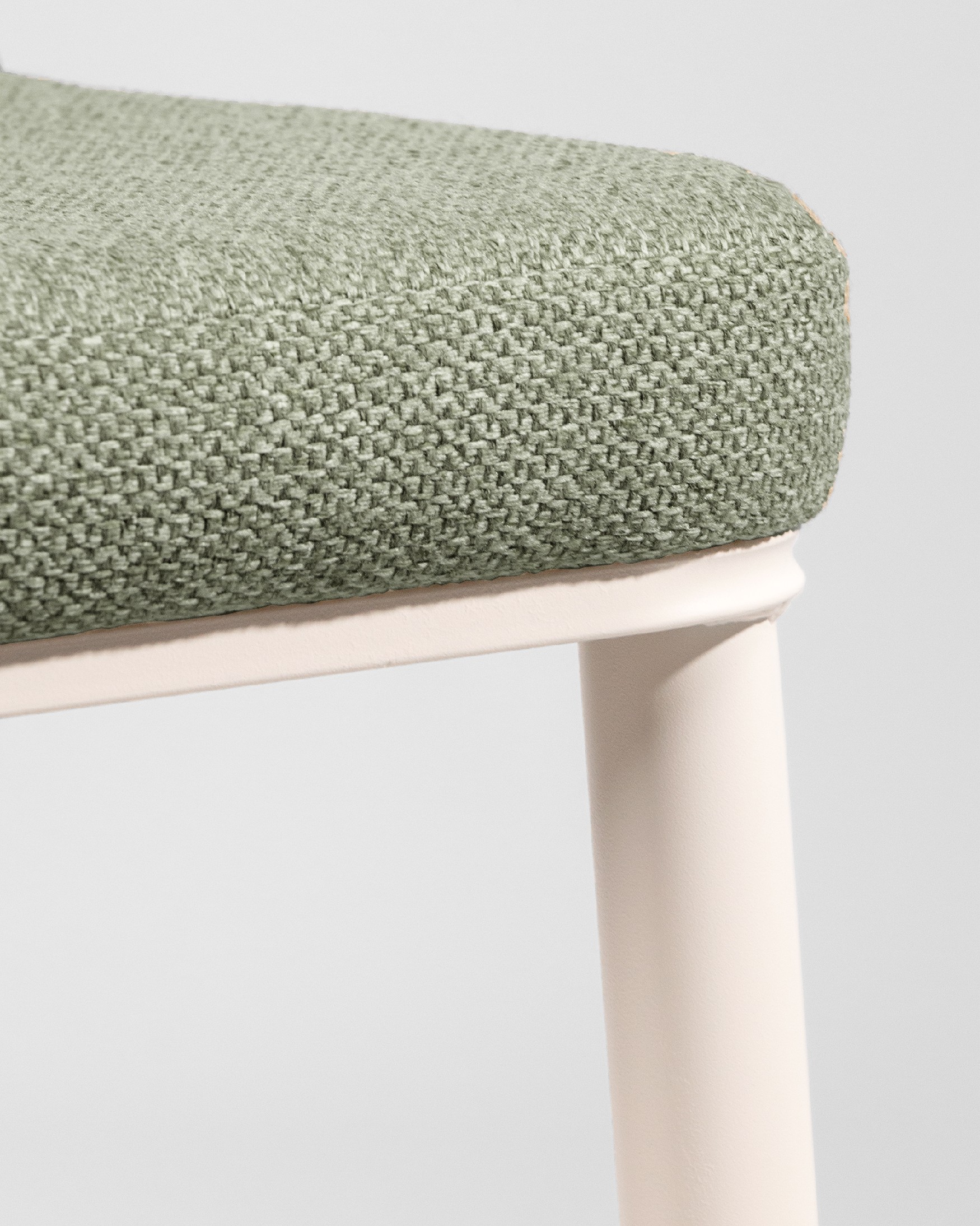 Tromso chair with green upholstery and ivory metal legs