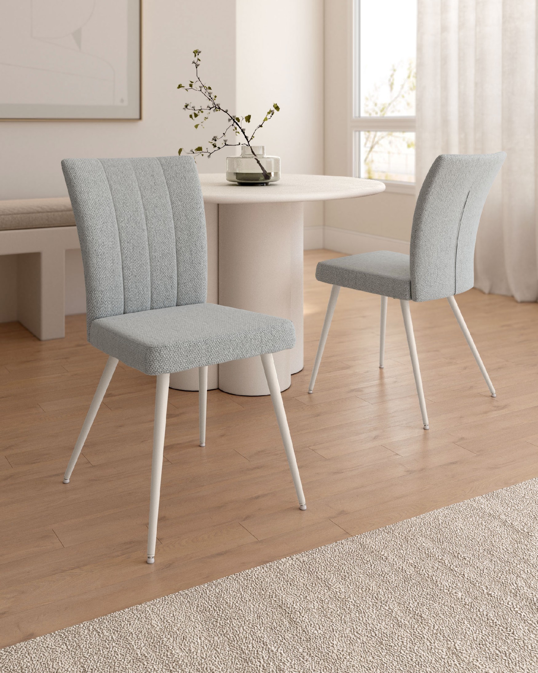 Tucson chair with gray upholstery and ivory metal legs