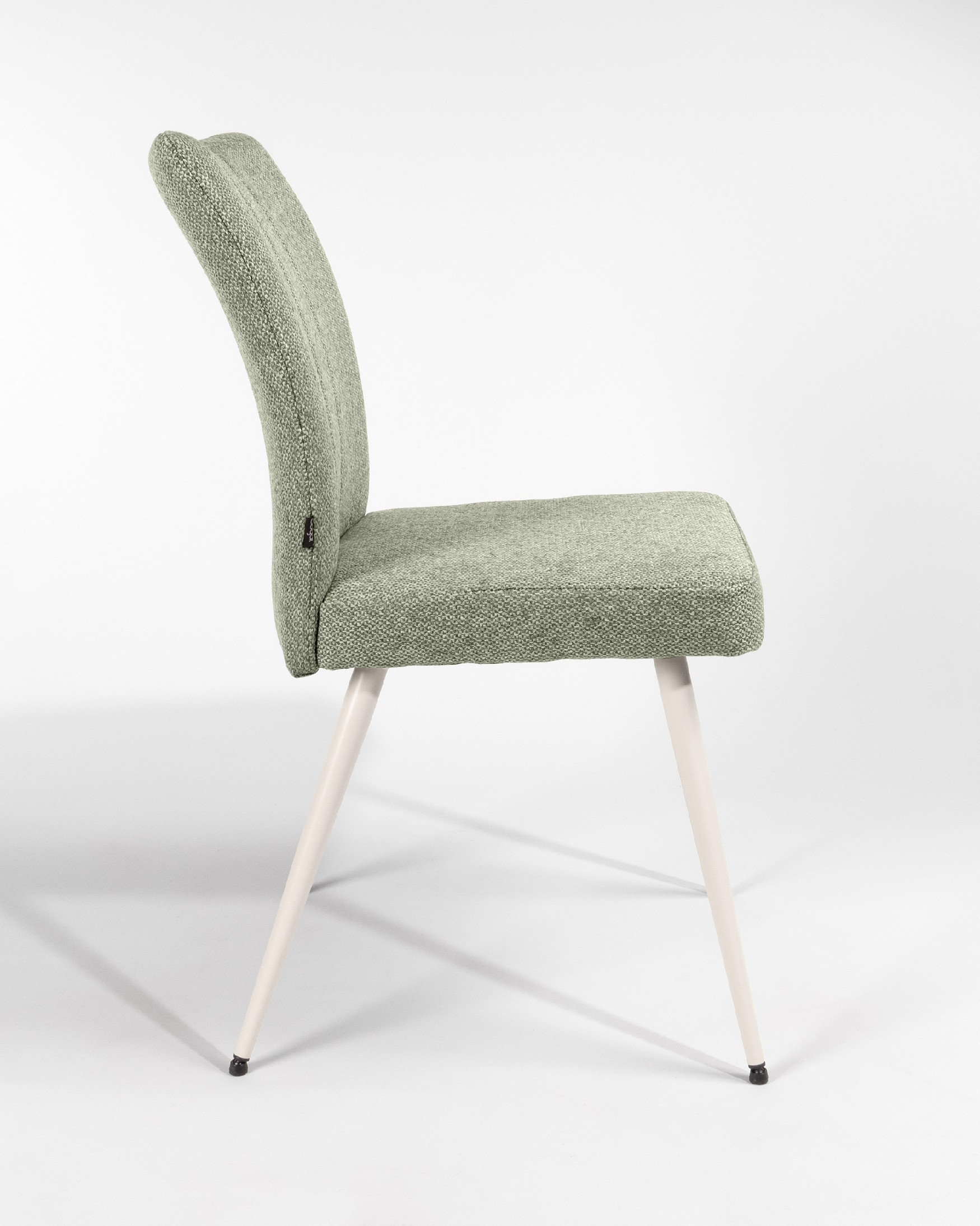 Chaise Tucson avec rembourrage vert et pieds métalliques ivoire