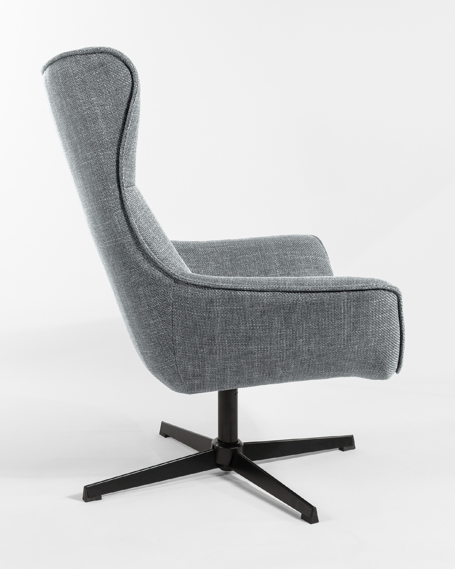 Tulip swivel armchair with gray upholstery and black metal legs.