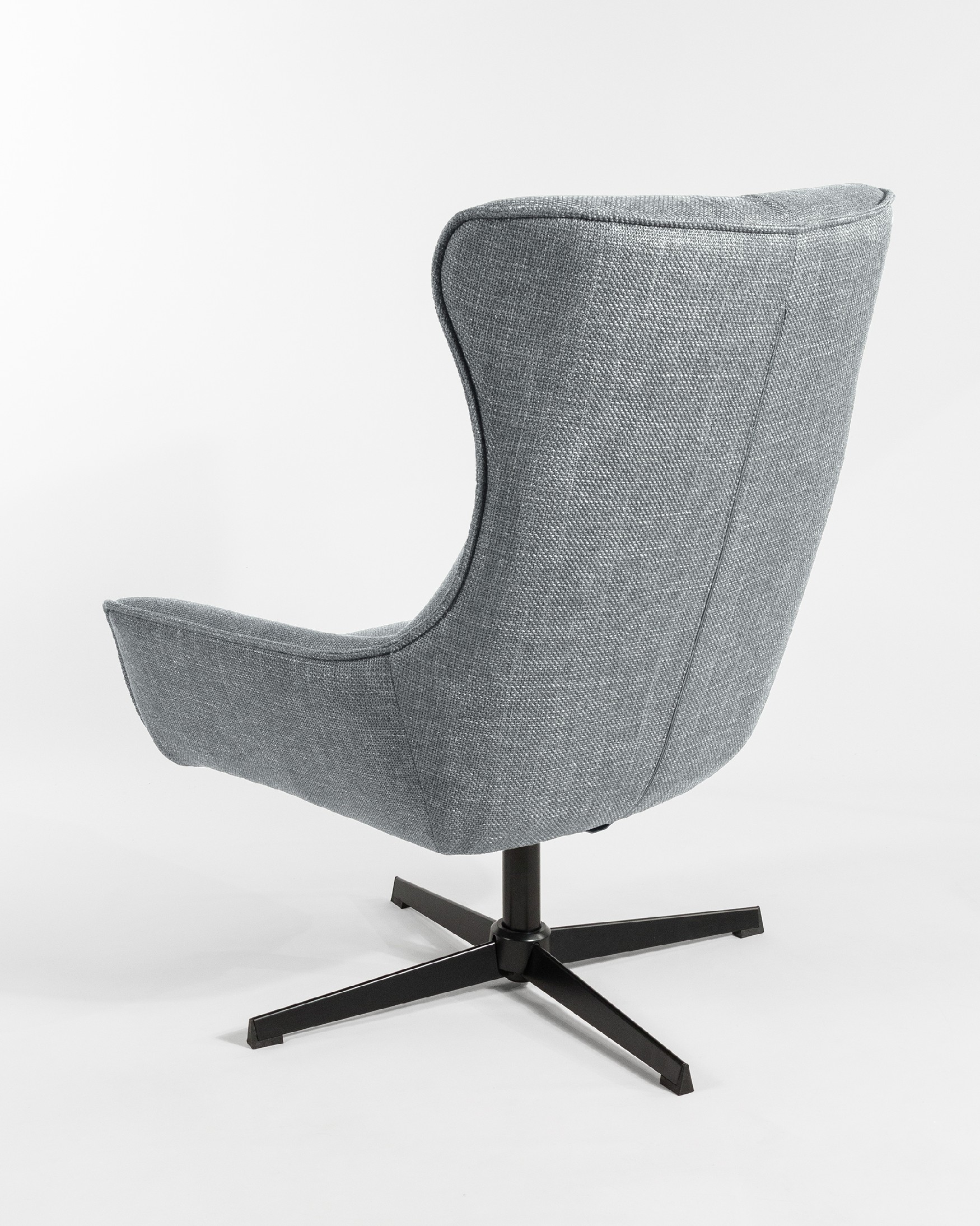 Tulip swivel armchair with gray upholstery and black metal legs.