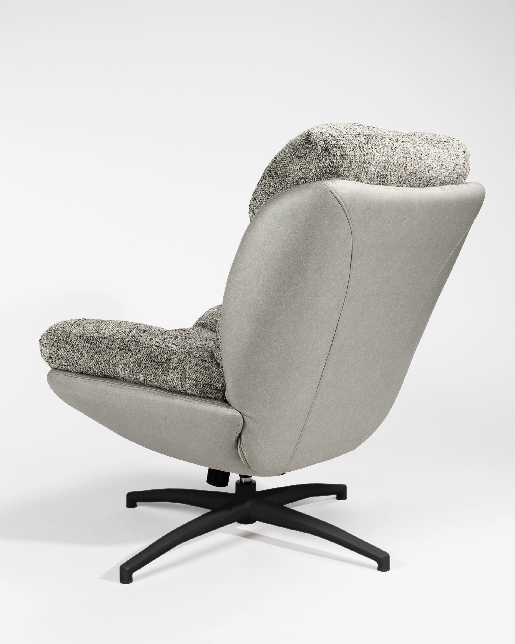 Tunia armchair with gray upholstery and cloud with black metal structure ottoman, 360° swivel rocking.