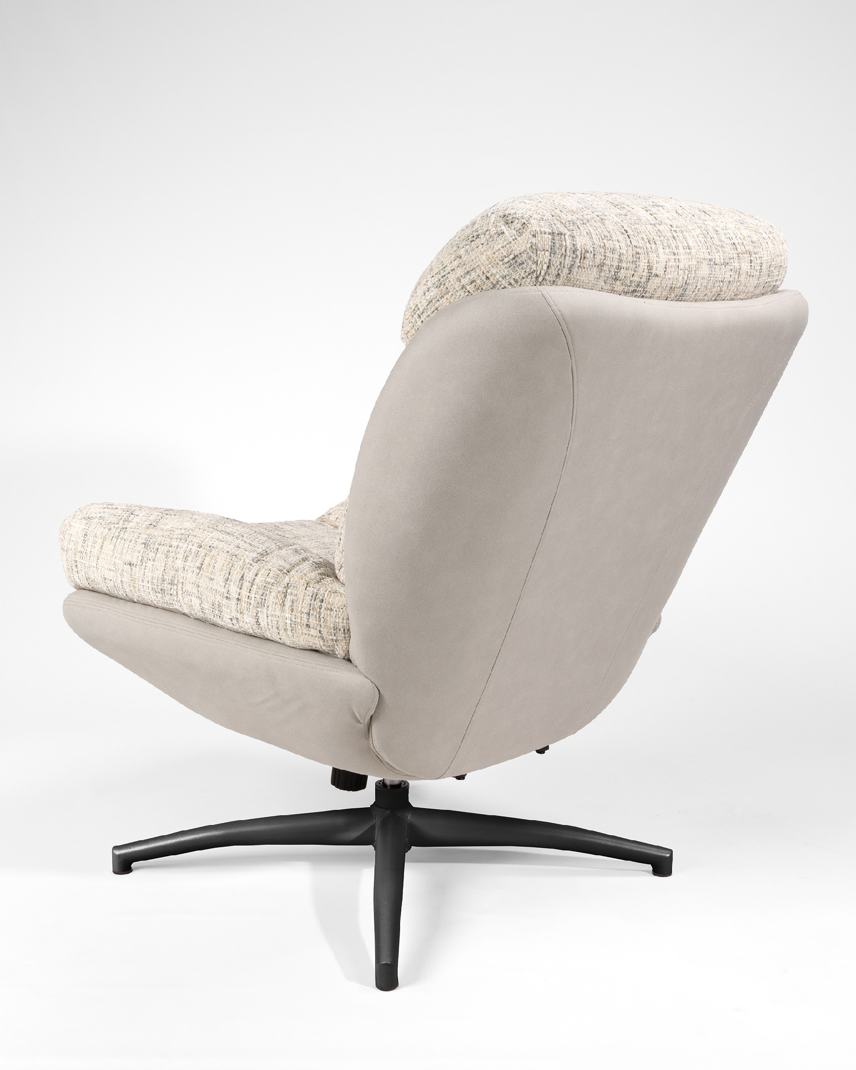 Tunia armchair with pearl and cloud upholstery and black metal frame ottoman, 360° swivel rocking.